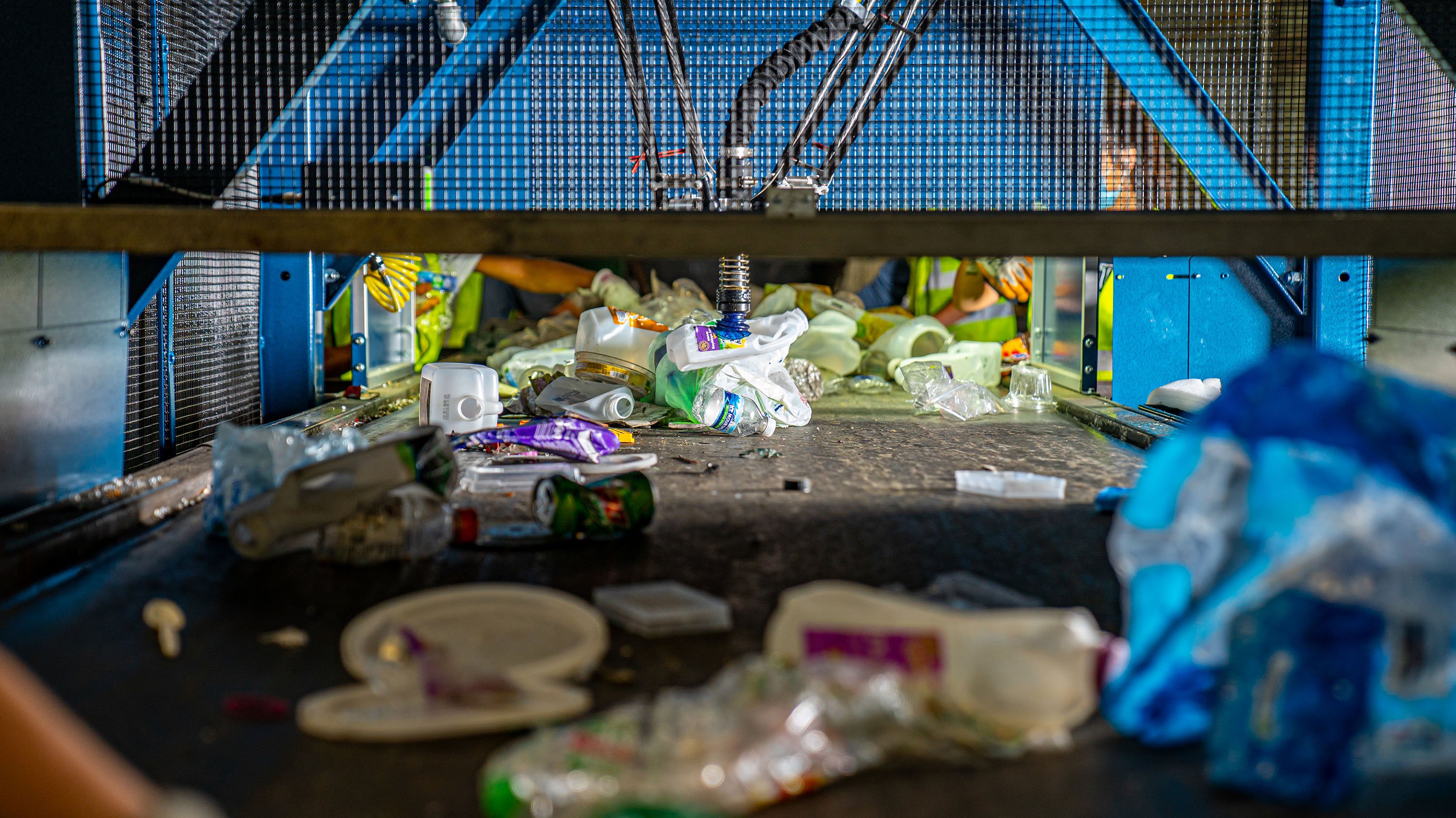 Items being sorted by a robotic recycling sorter