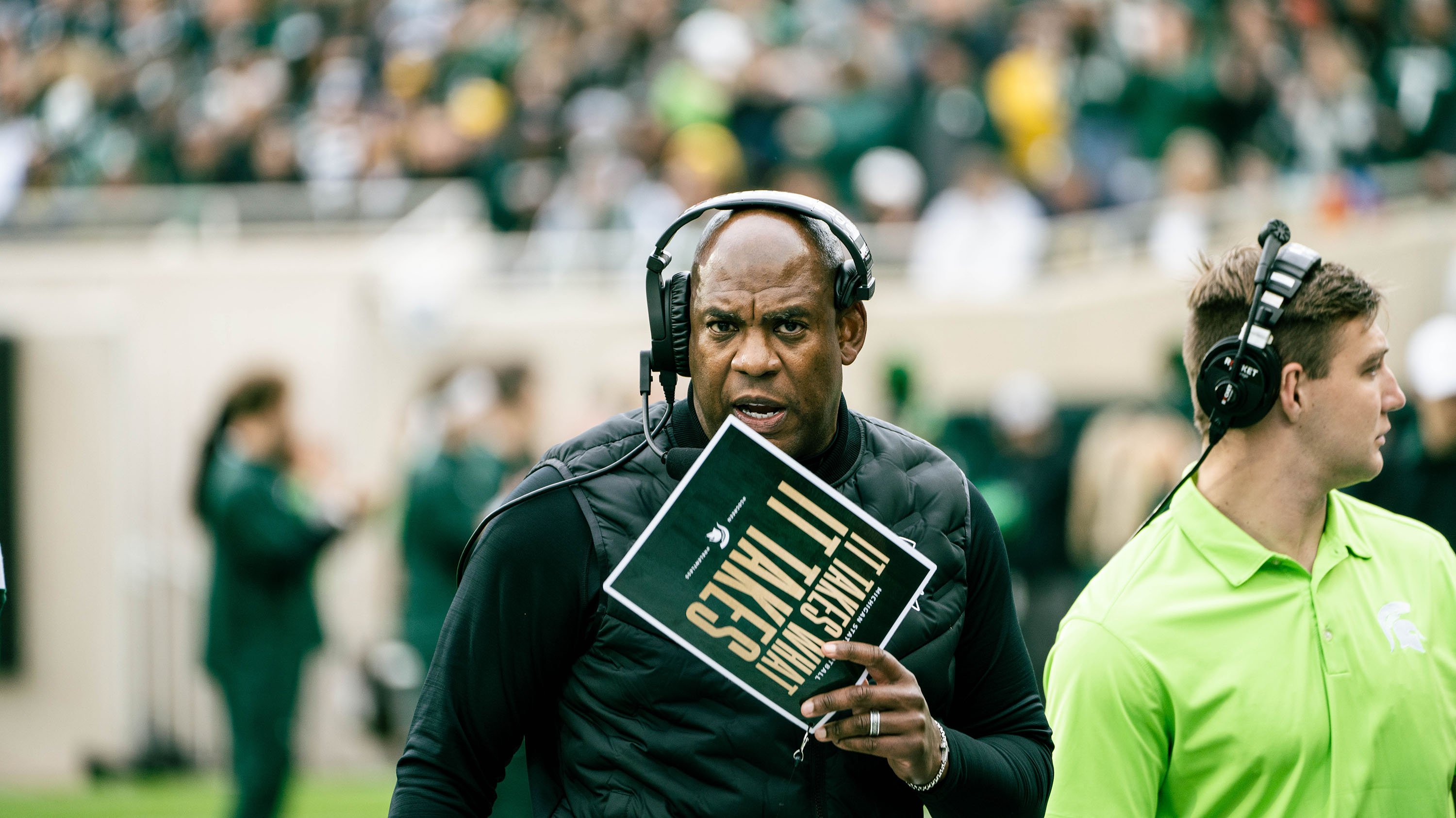 Coach Mel Tucker on the field at the MSU vs. U-M football game