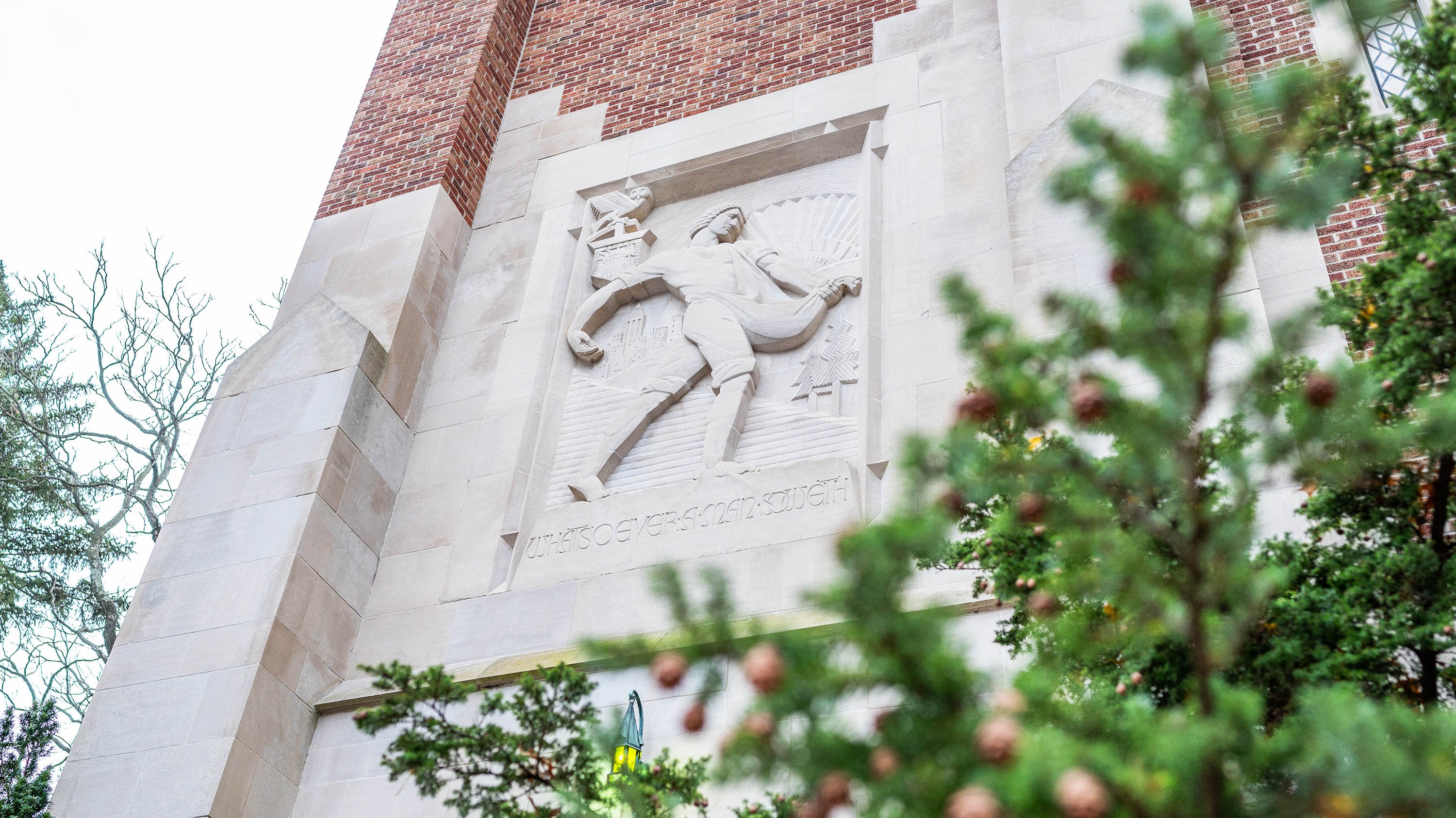 Beaumont Tower, with a close-up on the bas-relief sculpture 'The Sower'