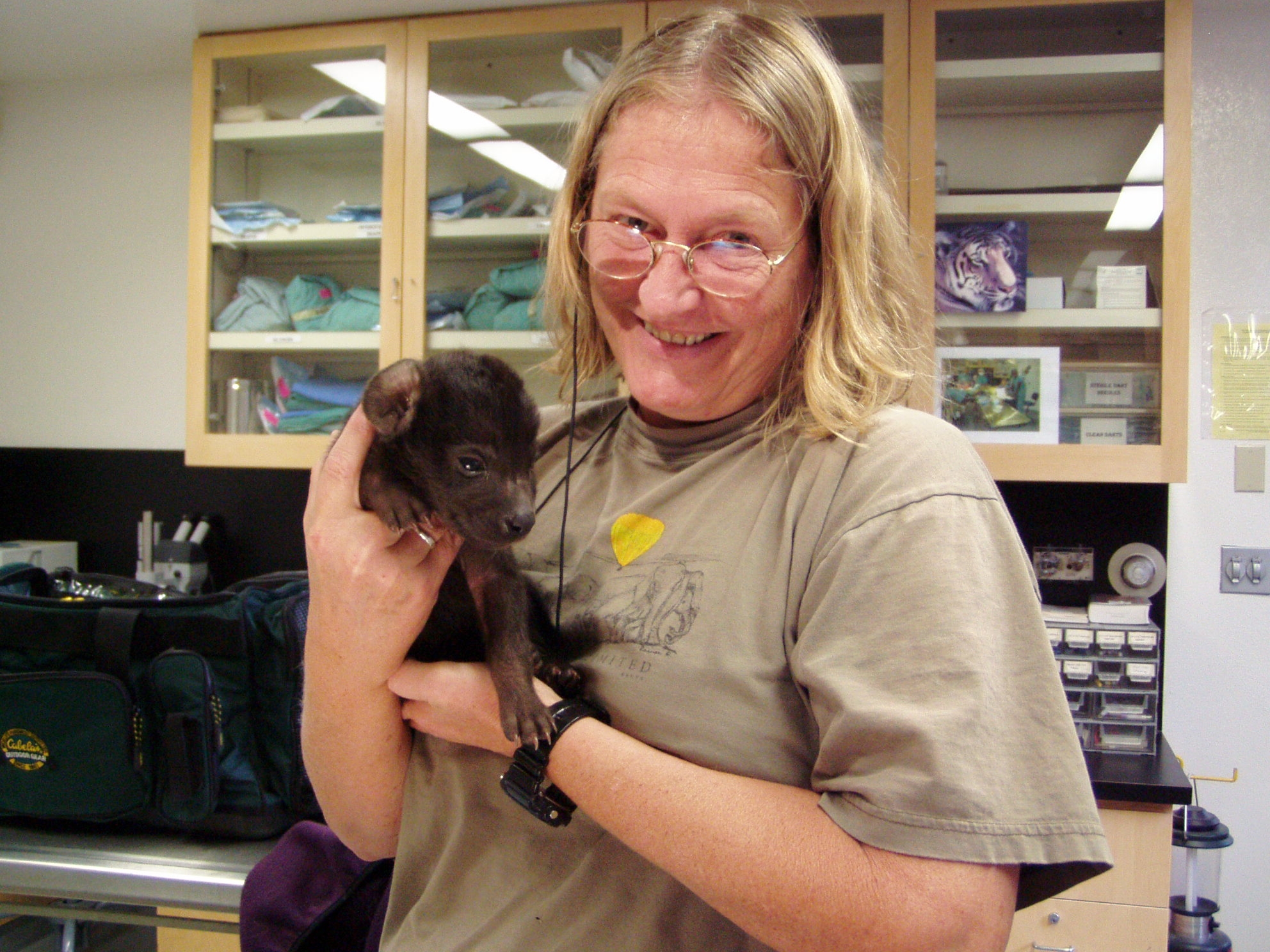 Michigan State University's Professor Kay Holekamp poses with a hyena cub.