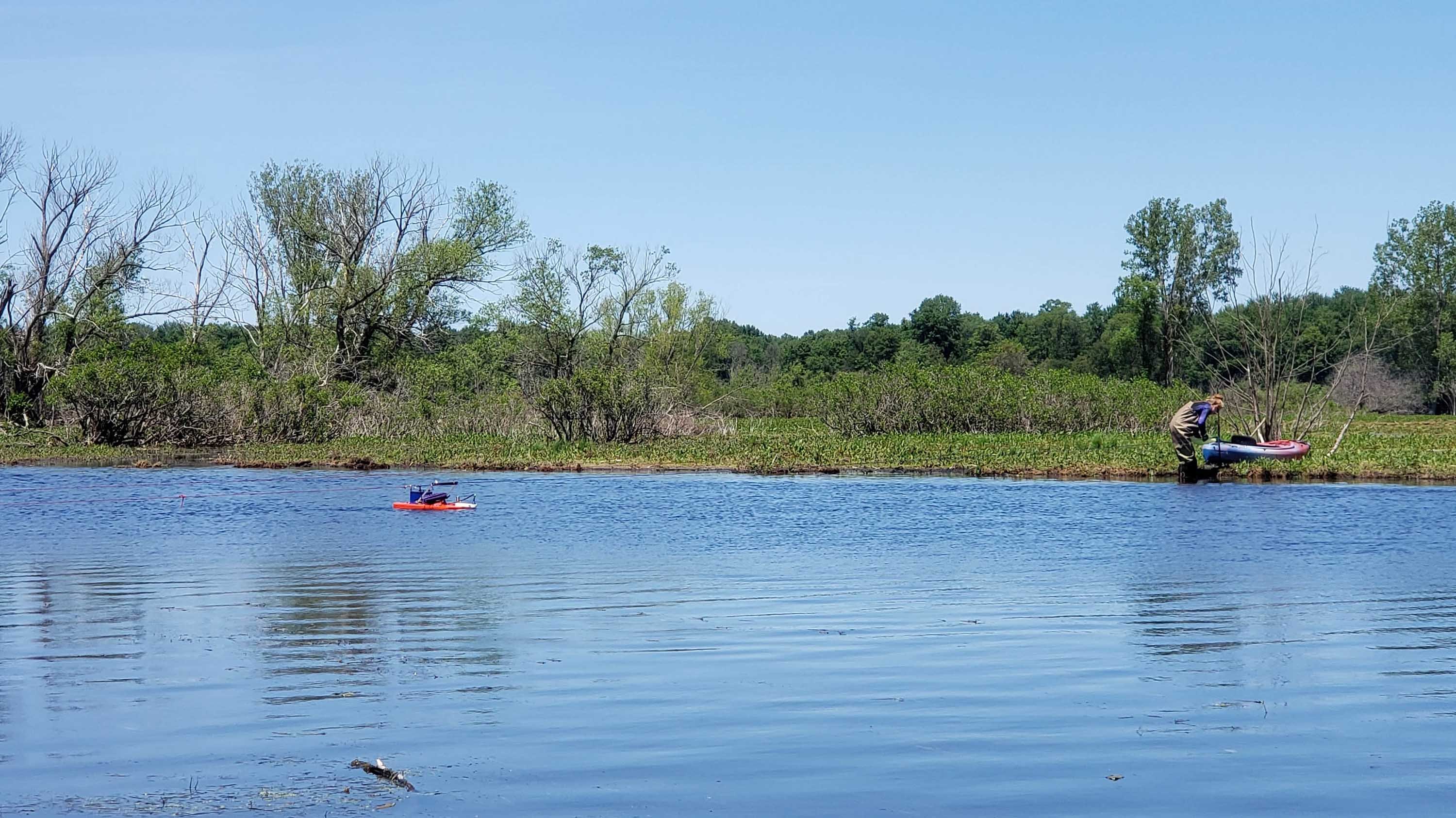 Wagner lab researcher stopping along the shore conducting research