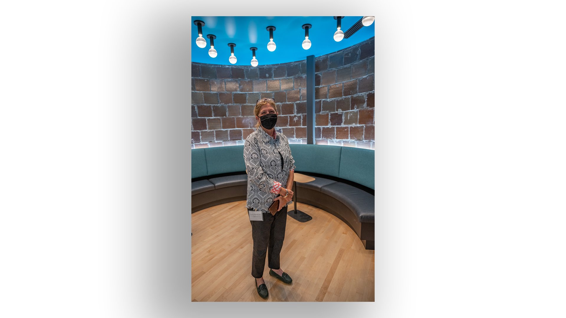 Teresa K. Woodruff, Provost and Executive Vice President for Academic Affairs, stands in a study and meeting space in the new STEM Teaching and Learning Facility that was once an ash silo in the Shaw Lane Power Plant.