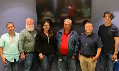 Posos-Parra with seed industry members in Salinas, Puerto Rico.