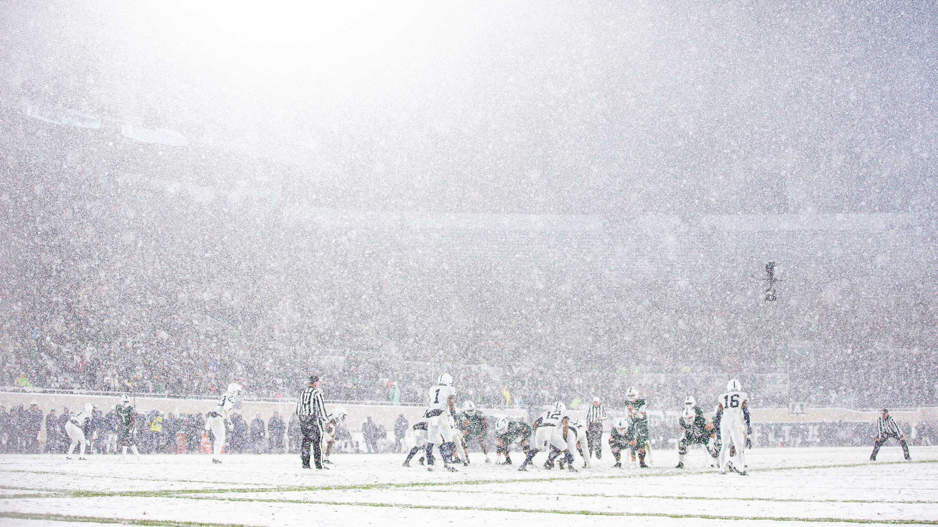 Snow on the field at an MSU football game