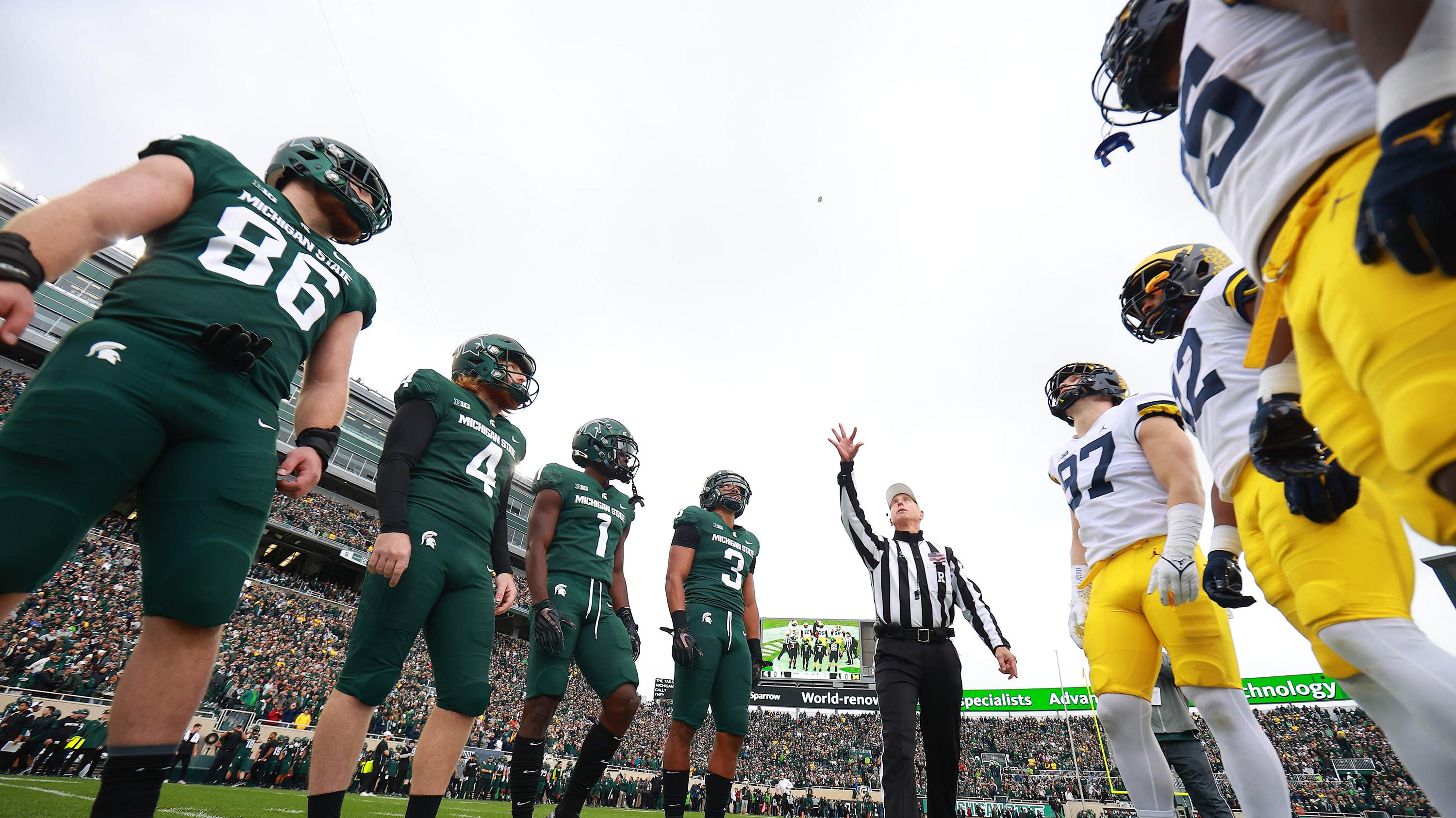 Referee coin toss at MSU vs. UM game