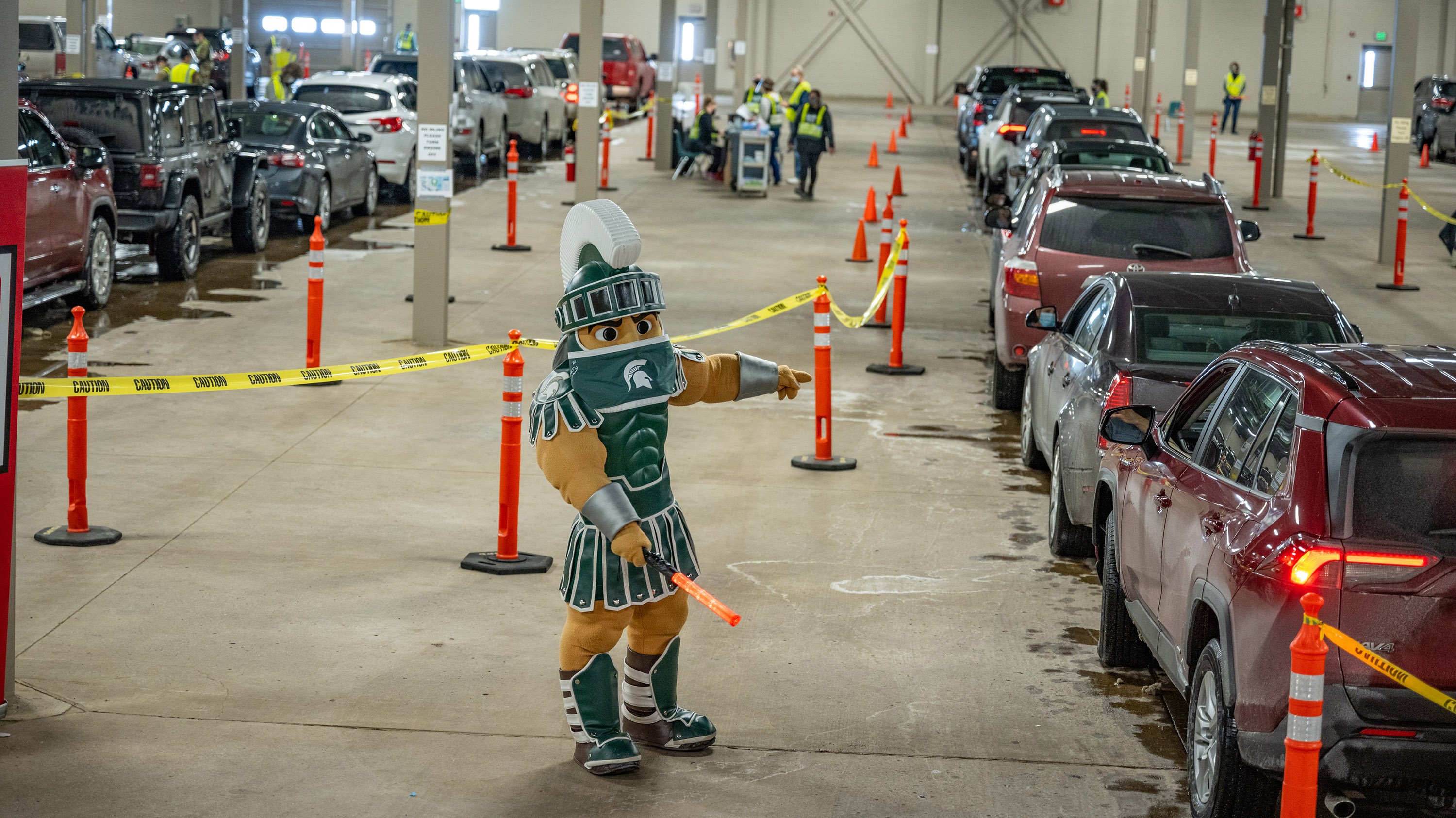 Sparty mascot at drive-through vaccination clinic
