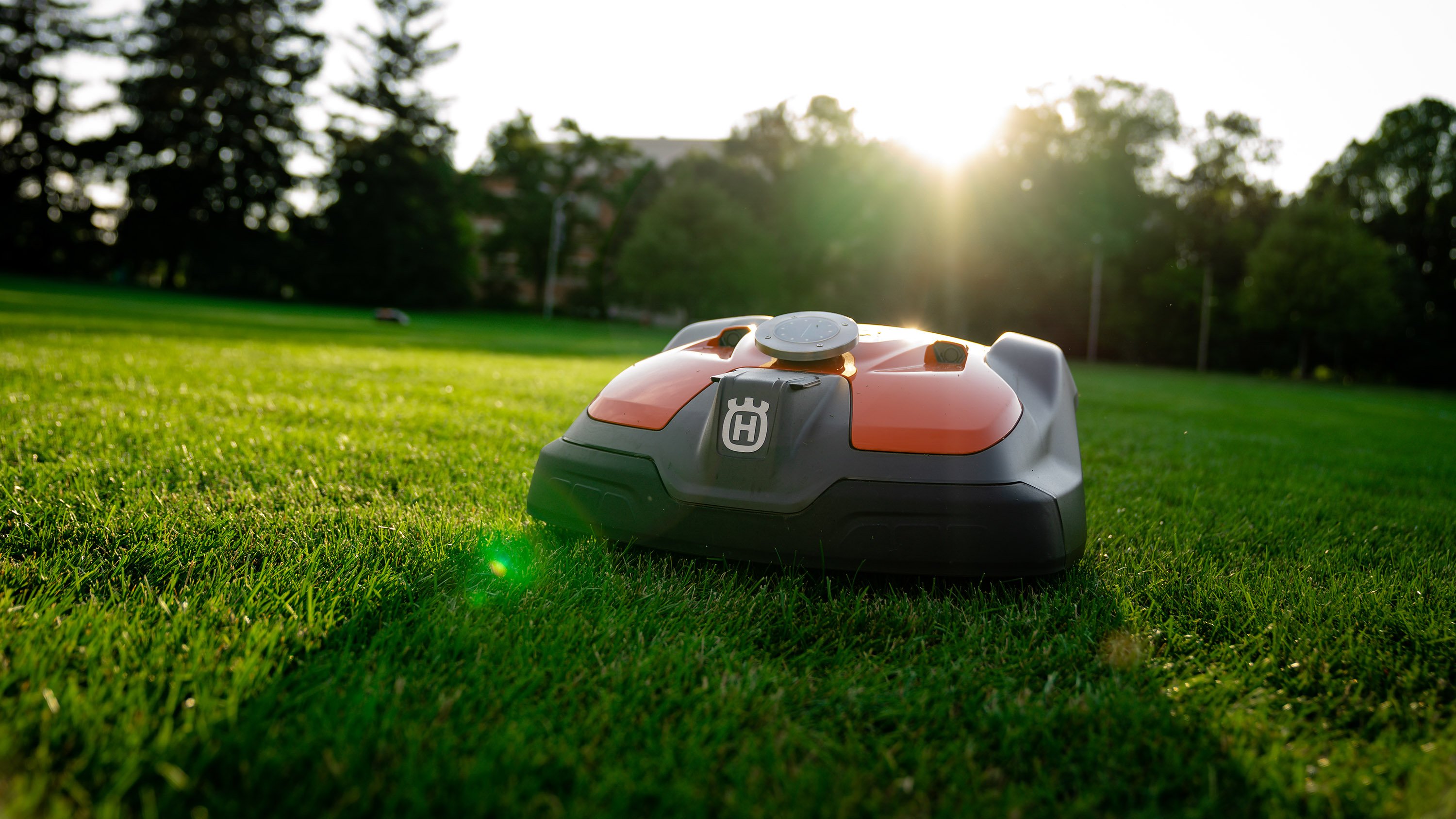 Autonomous lawn mower on the grass