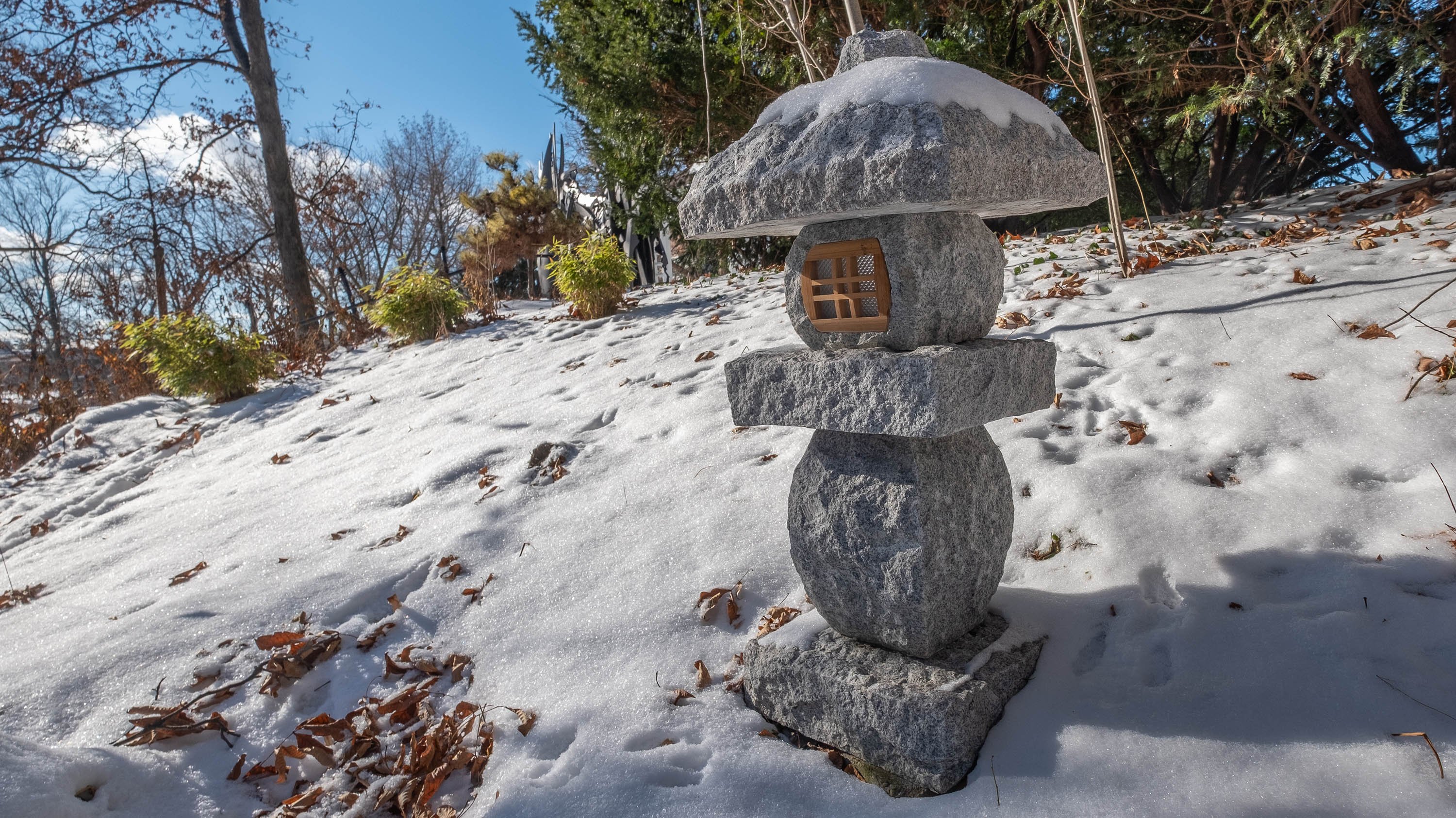 Japanese pagoda lantern in the William J. Beal Botanical Garden on a winter day