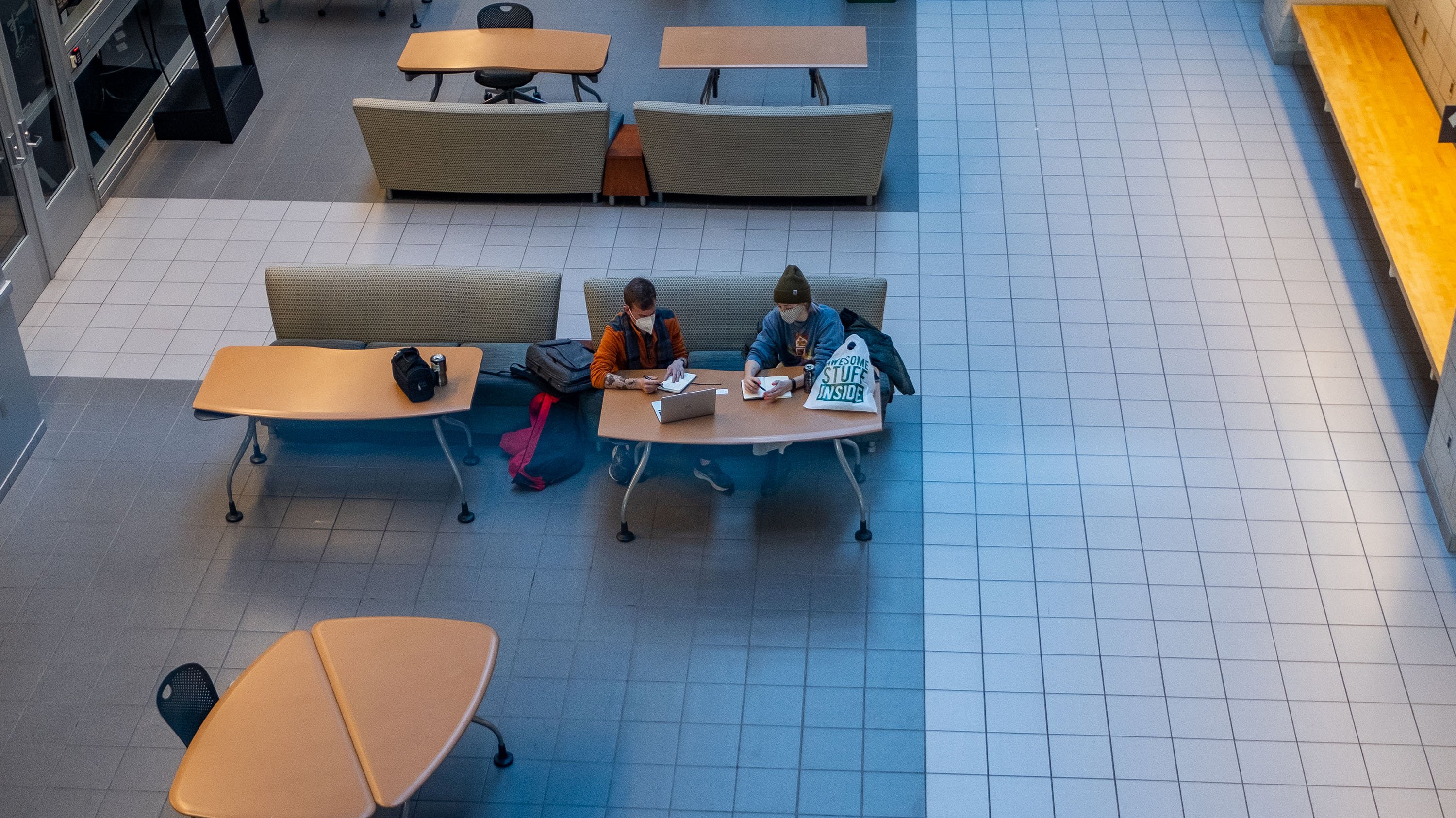 Students Doug Guzior and Kati Ford studying in the atrium of the BPS building