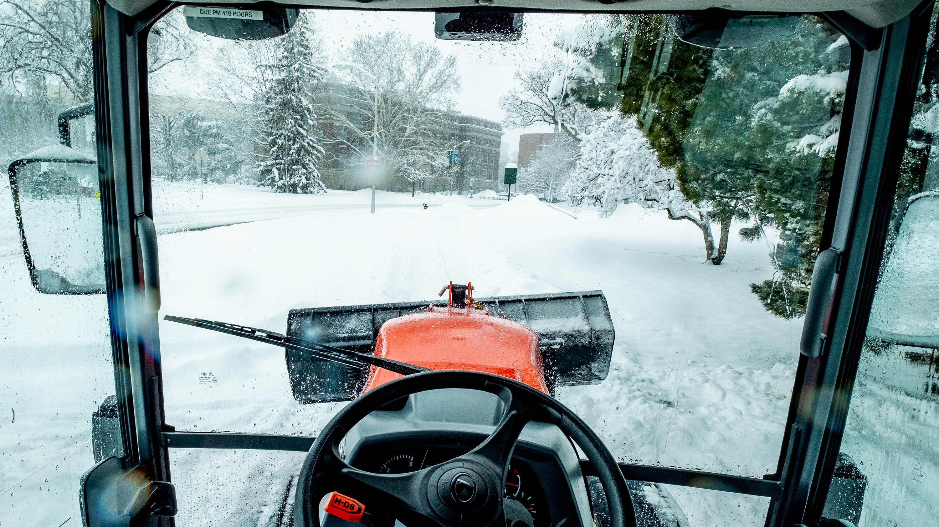 View of campus seen from inside a snow plow