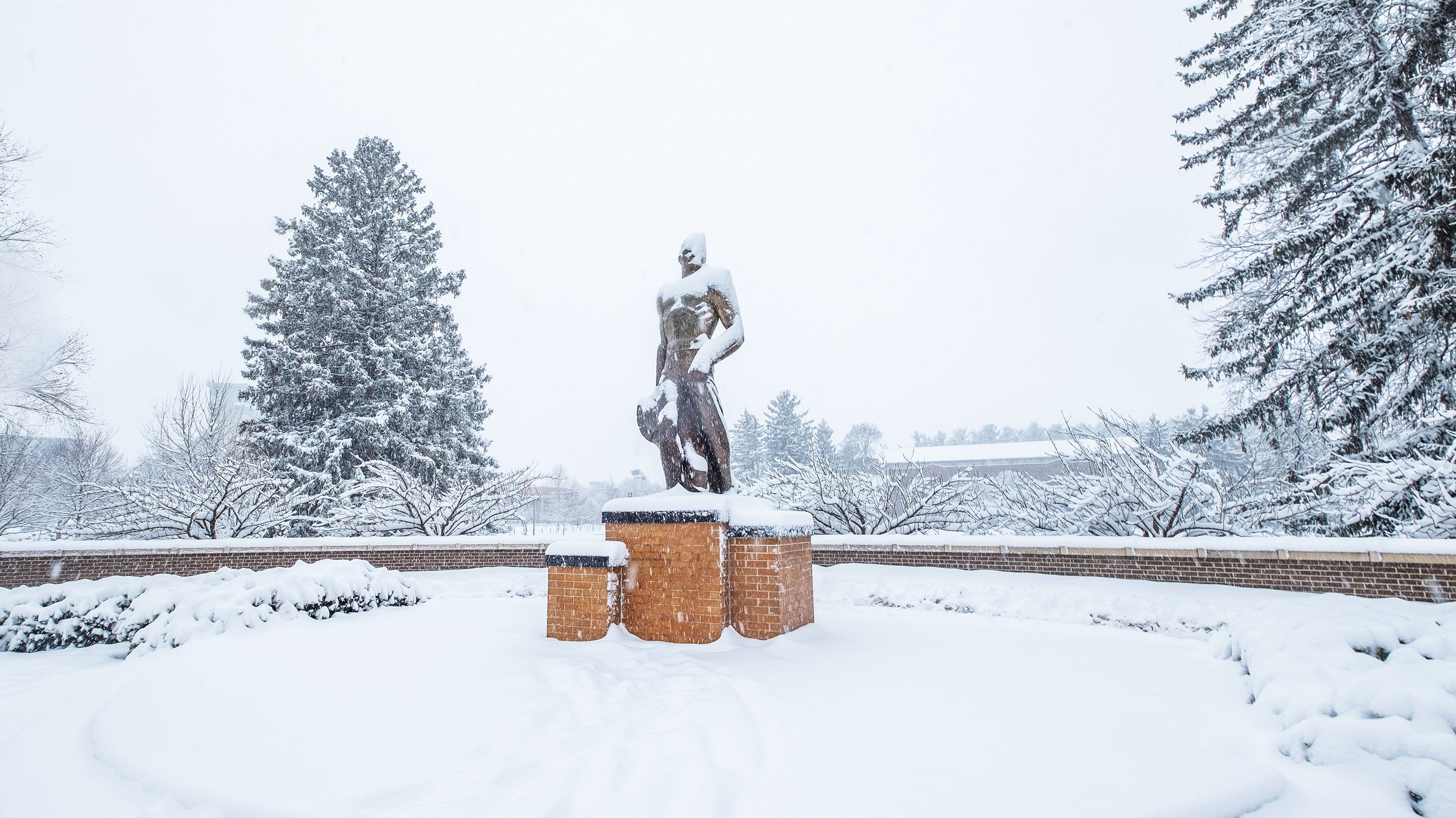 Spartan Statue covered in snow during winter storm