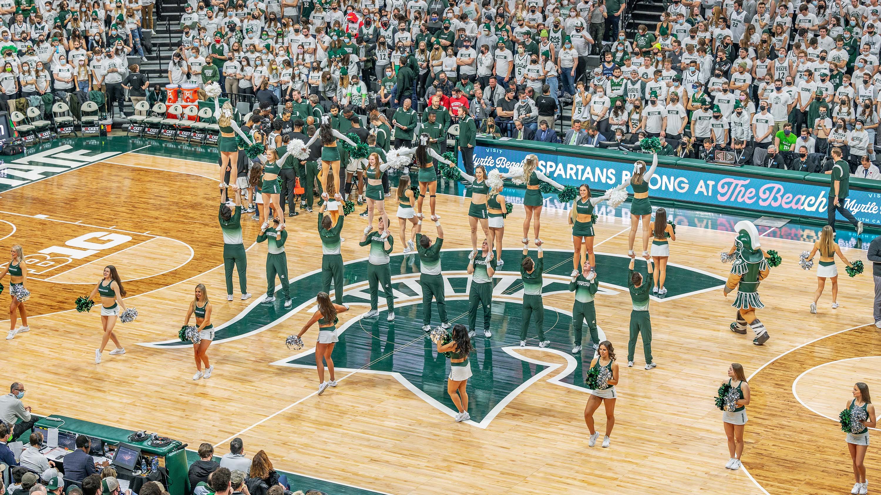 MSU Cheer team performing at MSU basketball game