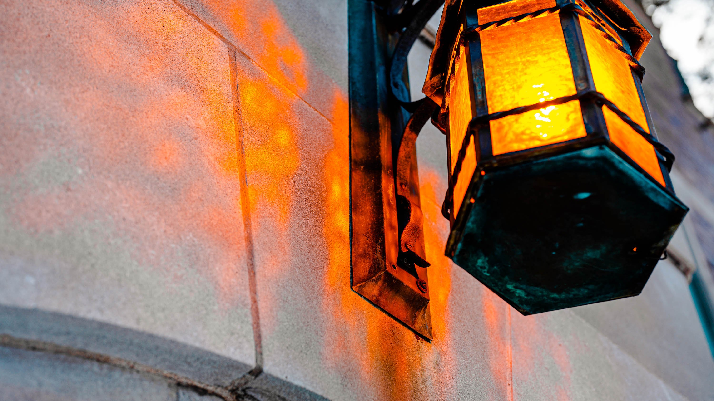 Close-up on lantern above entrance to Mason-Abbot hall