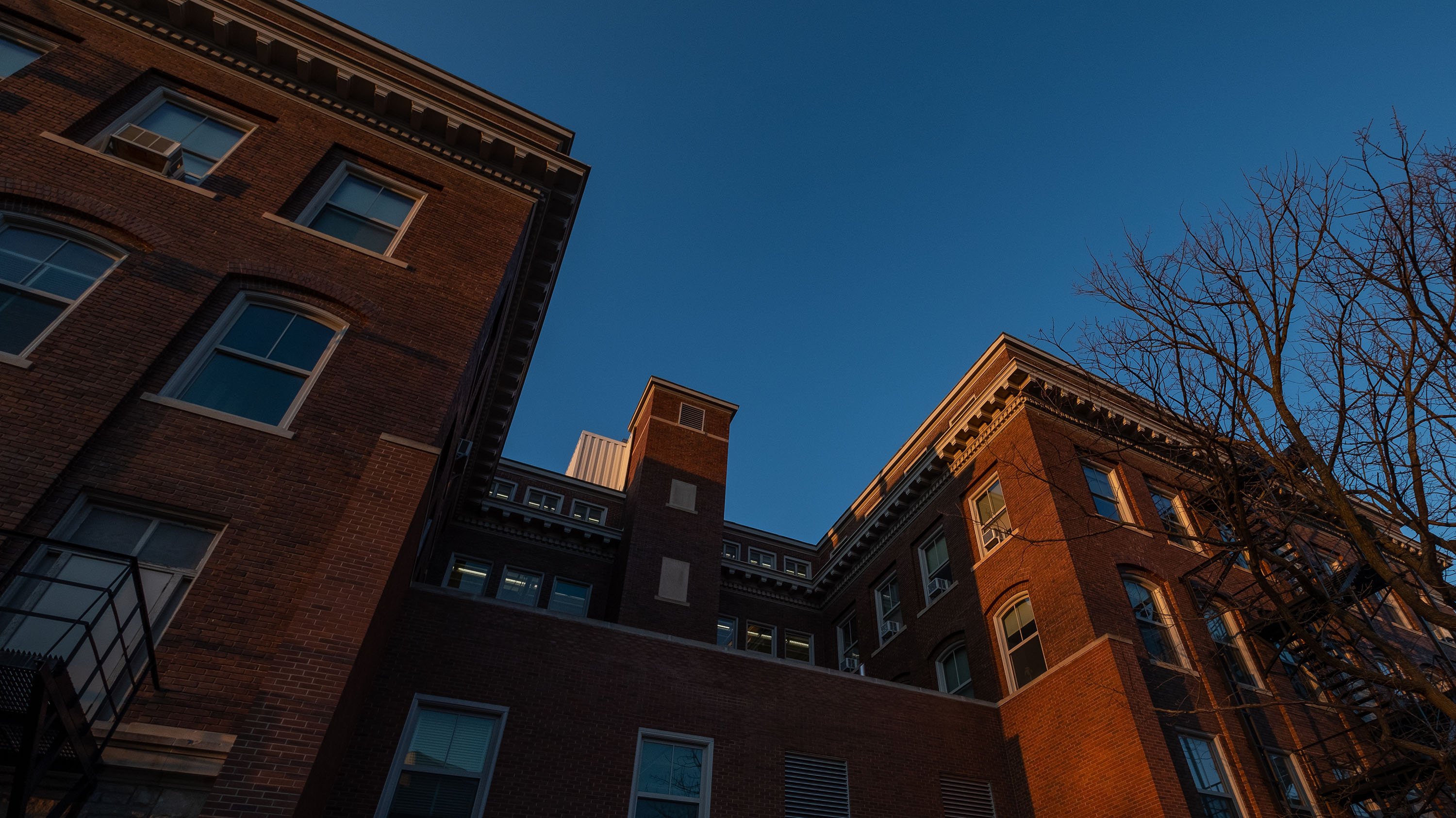 Dramatic angle of Olds Hall, showcasing dentil molding