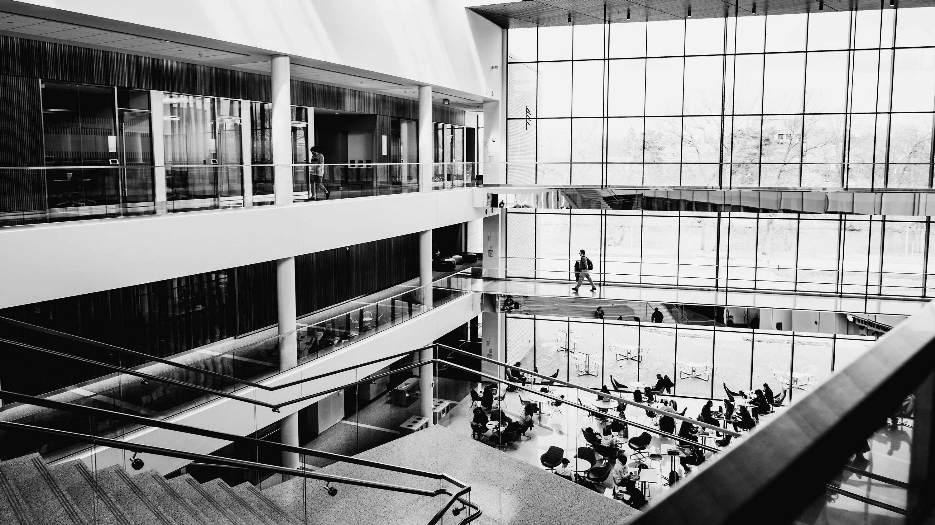 Black and white image of the Minskoff pavilion in the Broad College of Business, overlooking the atrium