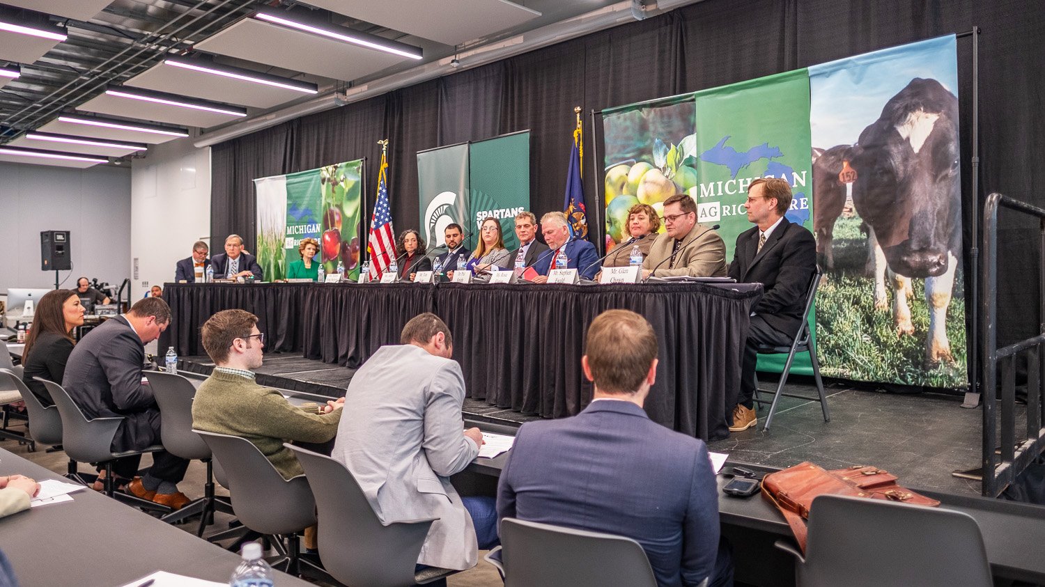 Panel of leaders in front of audience during Farm Bill hearing
