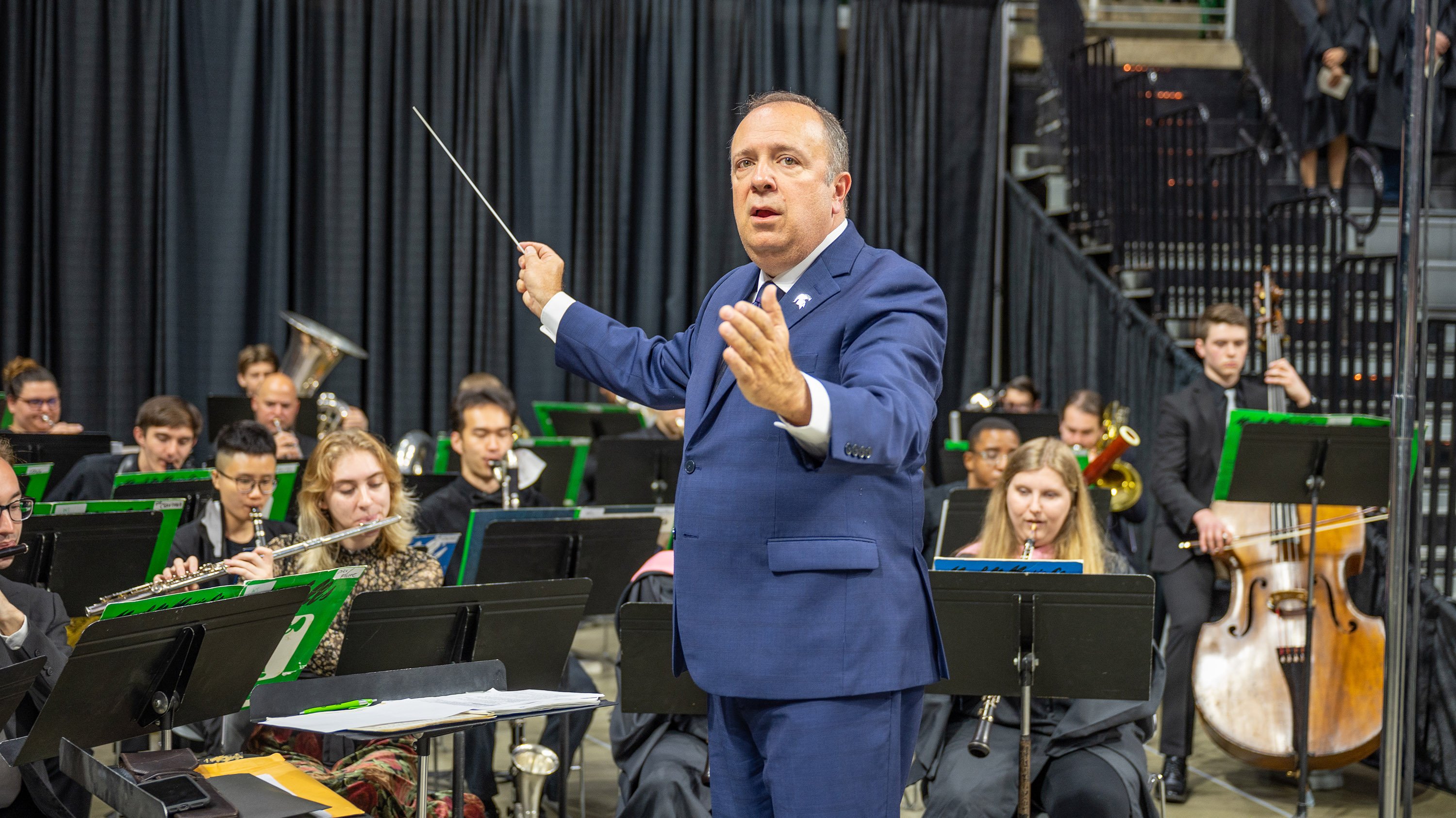 MSU Kevin Sedatole and the MSU orchestra provides the music at the 2022 Spring Commencement in the Breslin Center