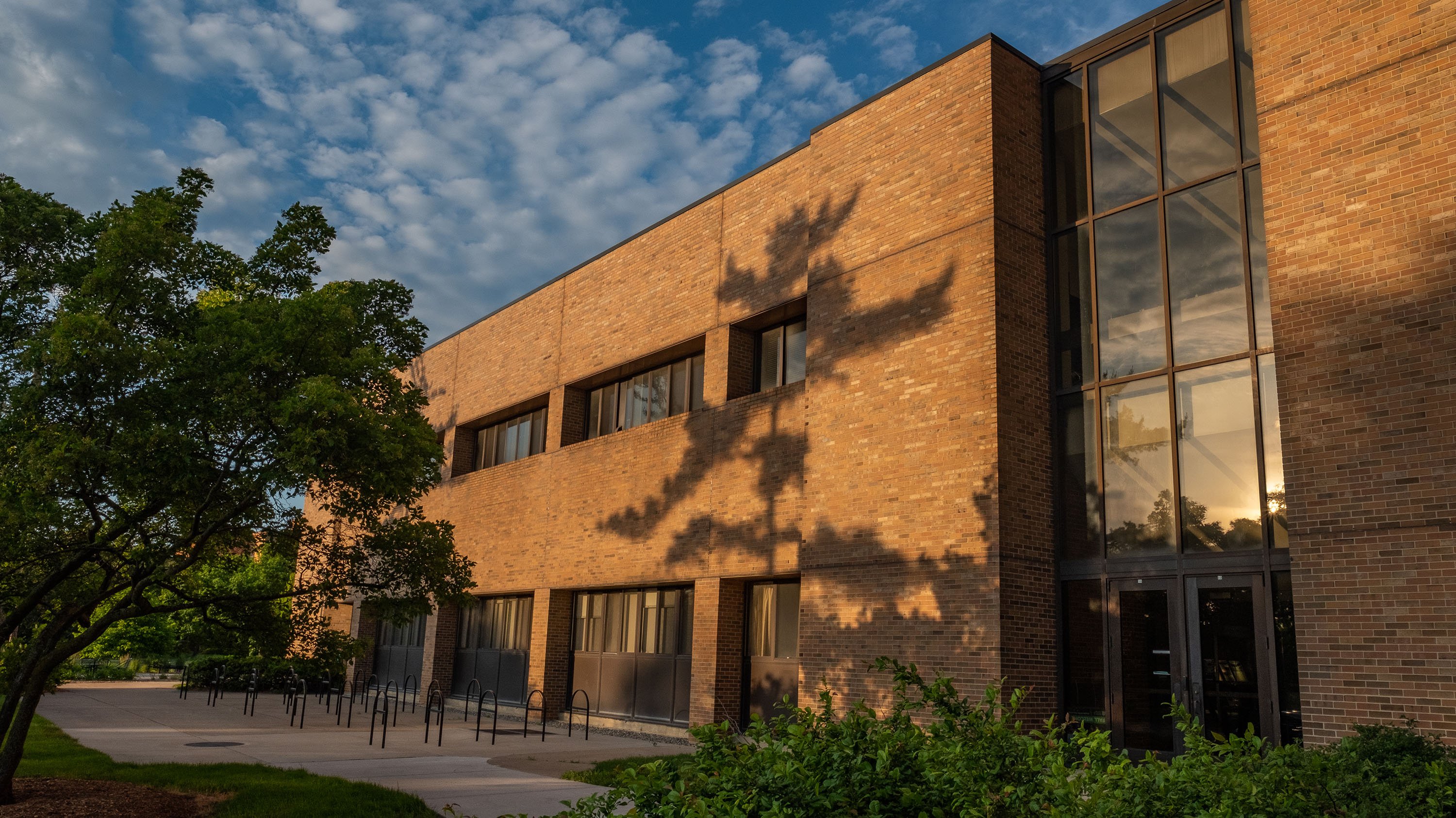 Communication Arts and Sciences building at sunset