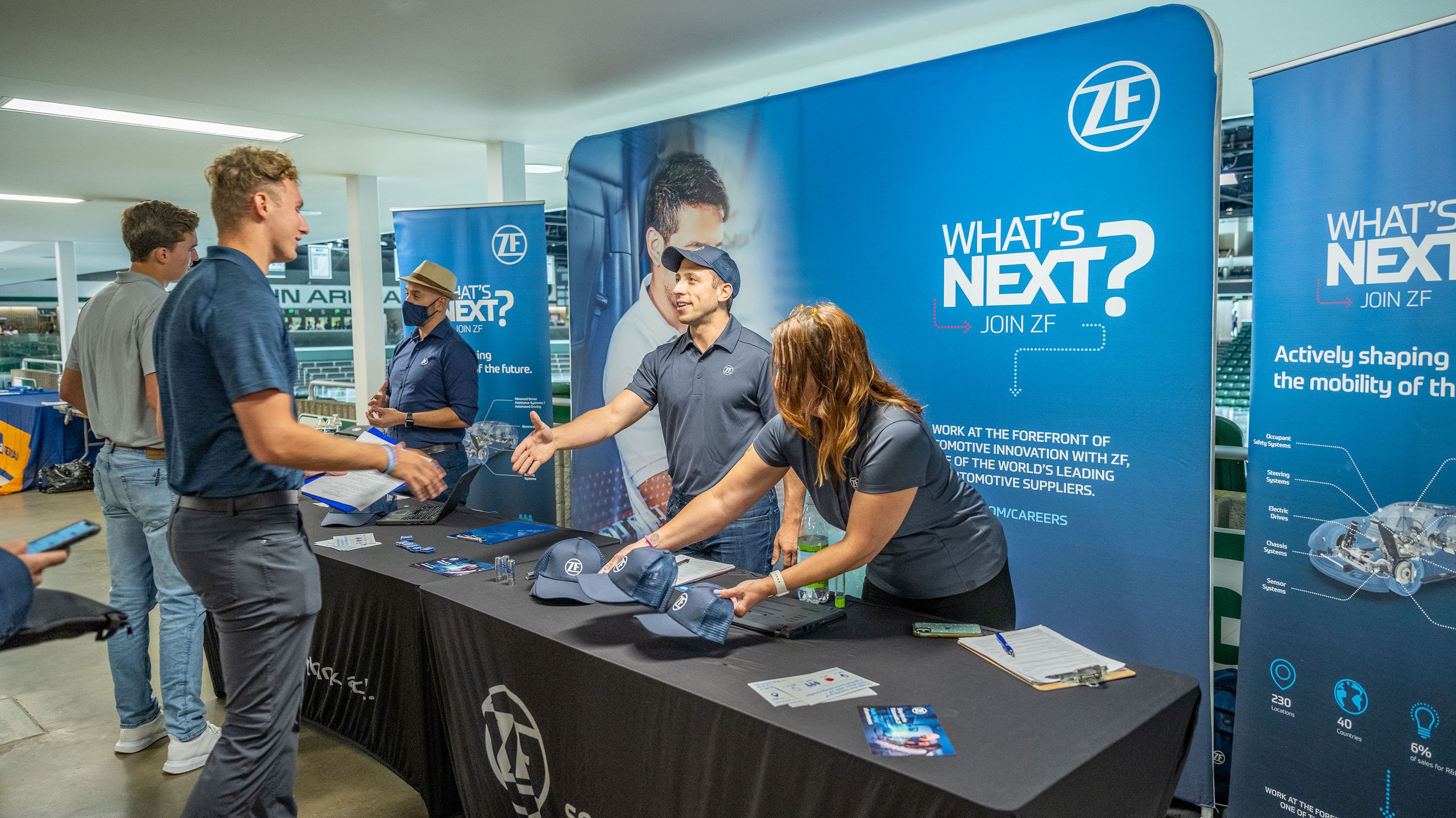 Student and recruiter shaking hands at College of Engineering career fair 