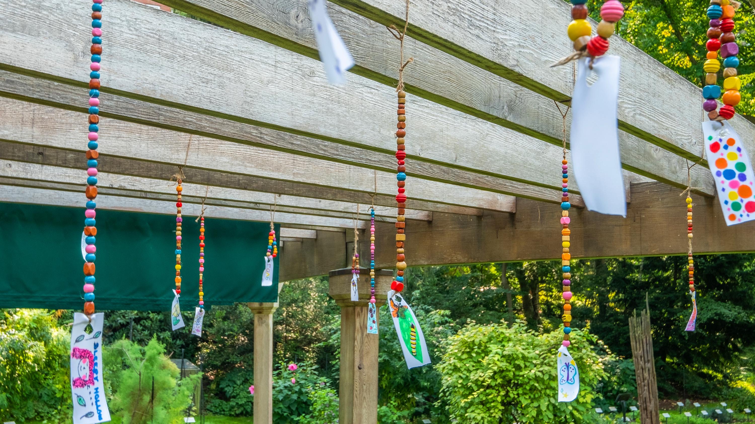 Colorful beads on the pergola in the William J. Beal Botanic Garden.