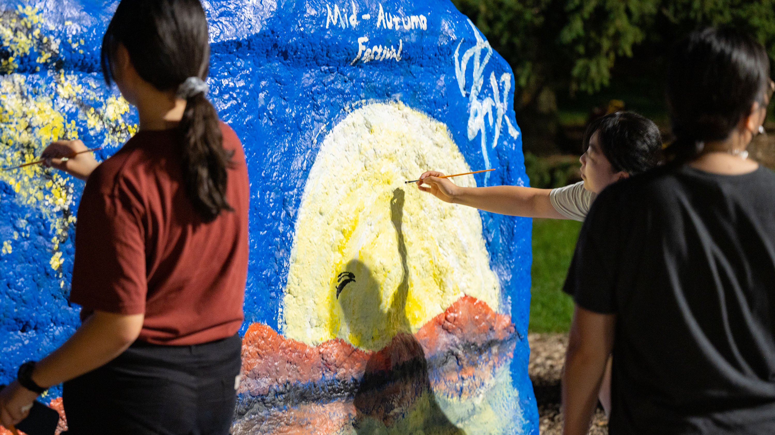CSSA students painting the Rock for Mid-Autumn Festival