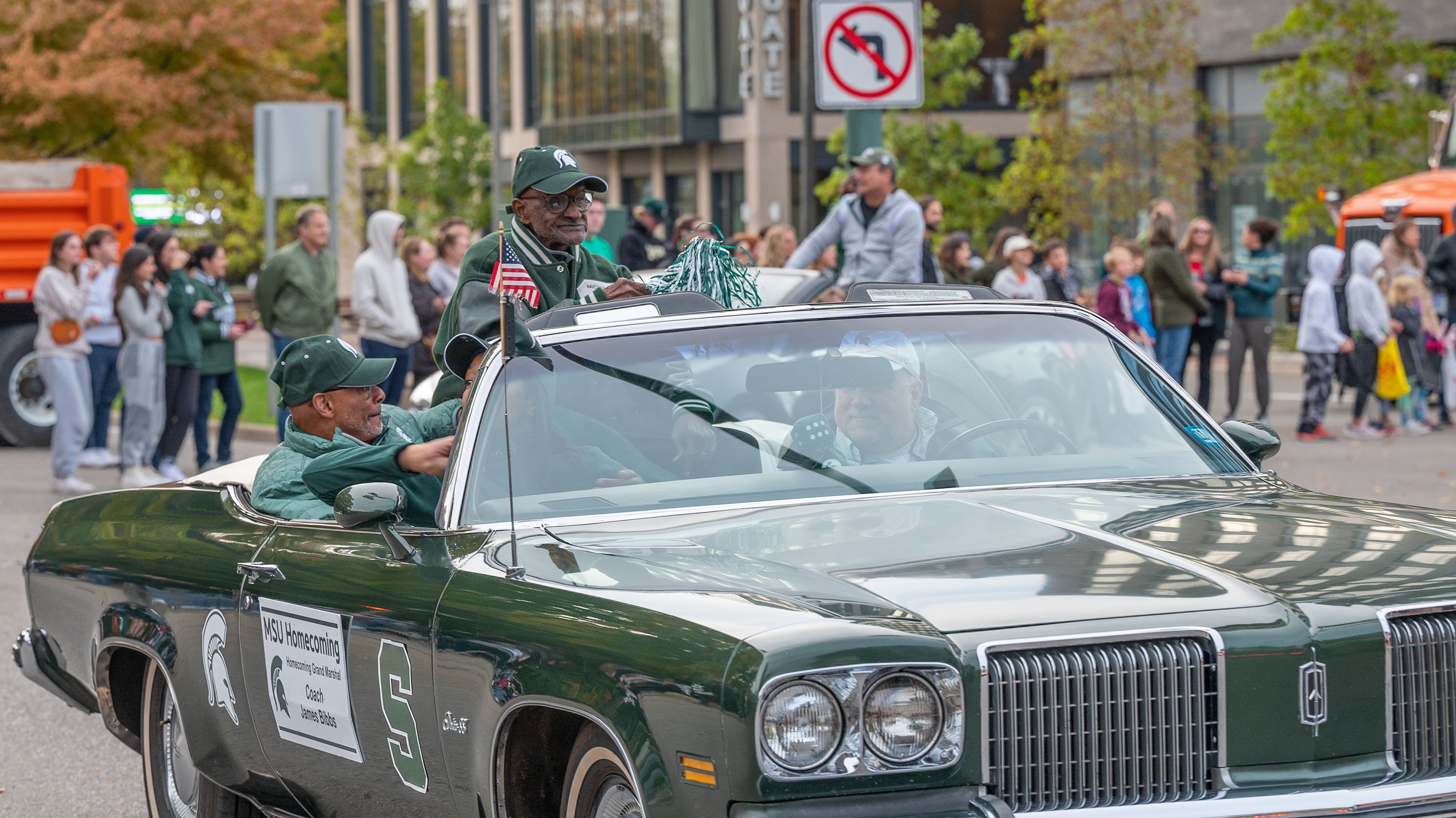 2022 Homecoming Grand Marshal James Bibbs, in the Homecoming Parade on Grand River Avenue in East Lansing.