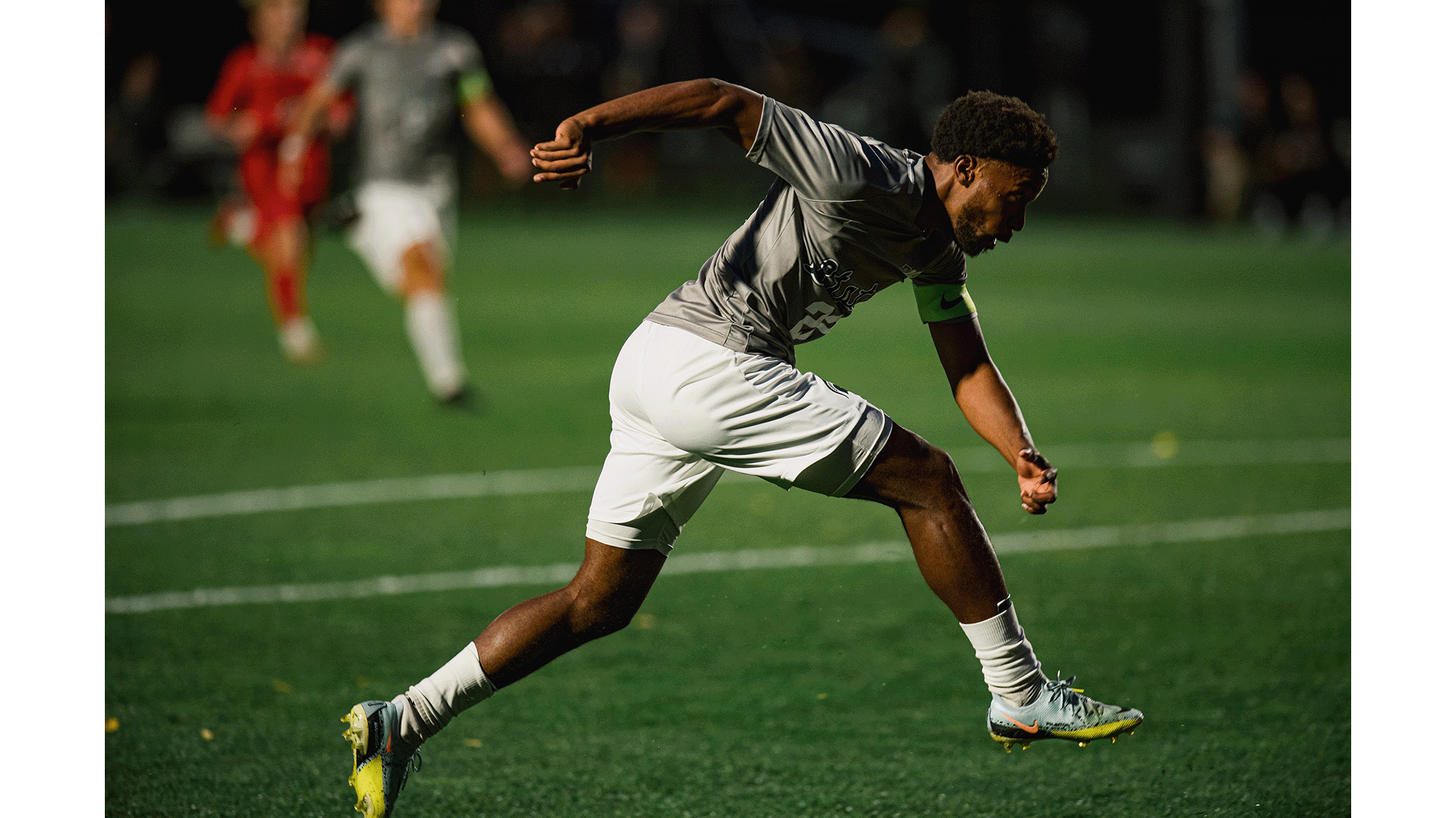 Soccer player kicking a ball