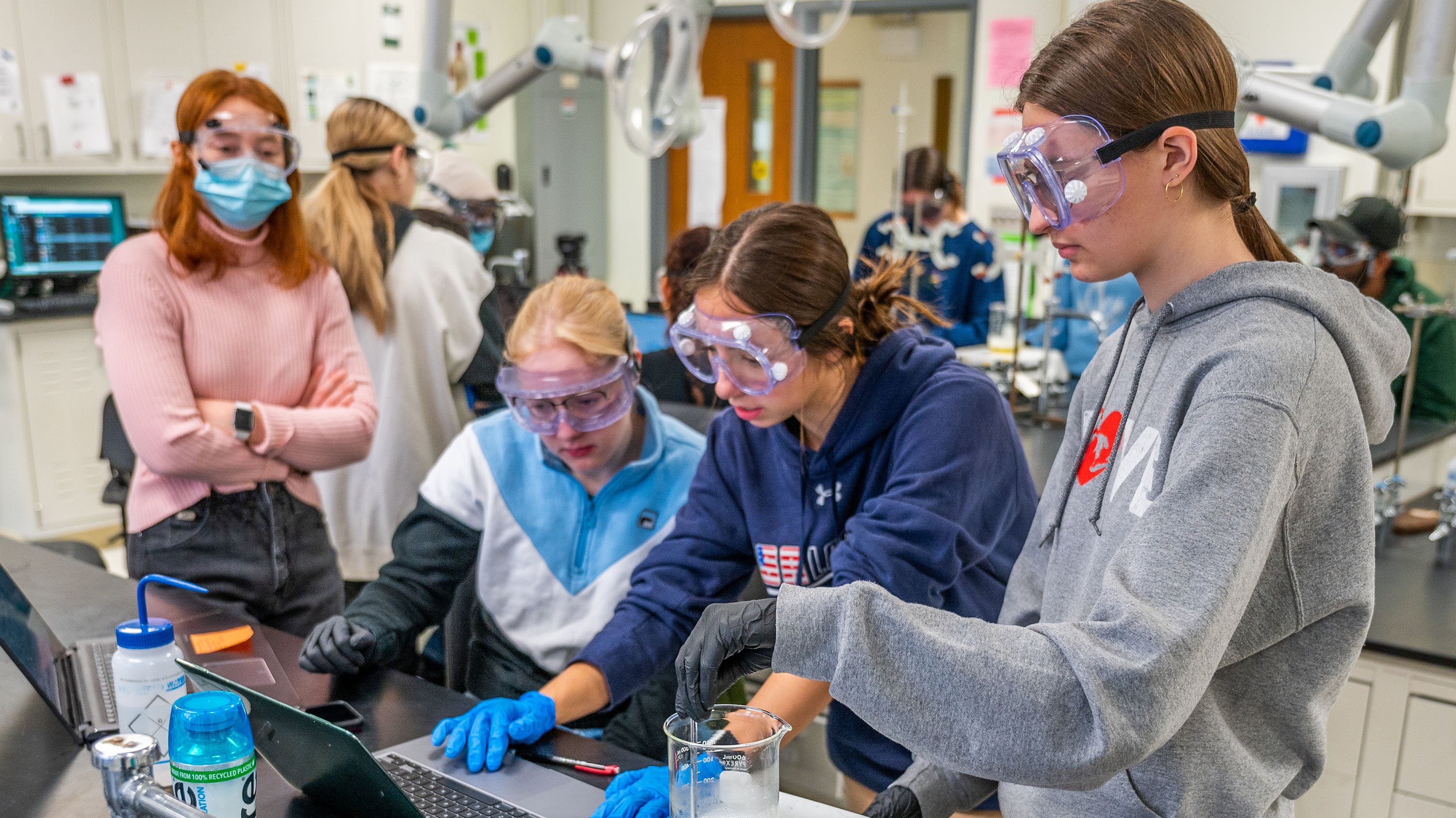 Students experimenting in a lab
