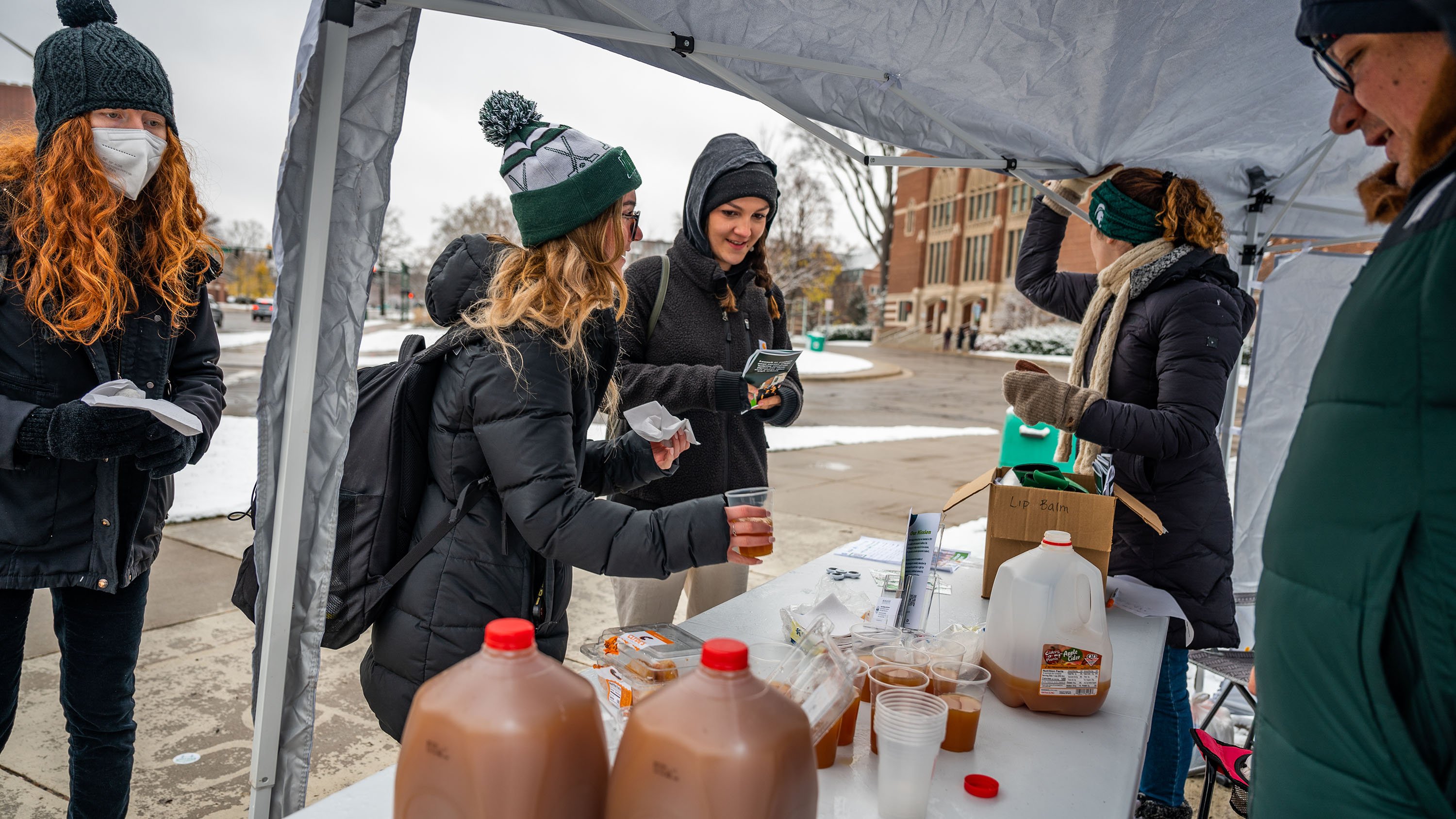 College Advising Corps hands out cider and donuts to students