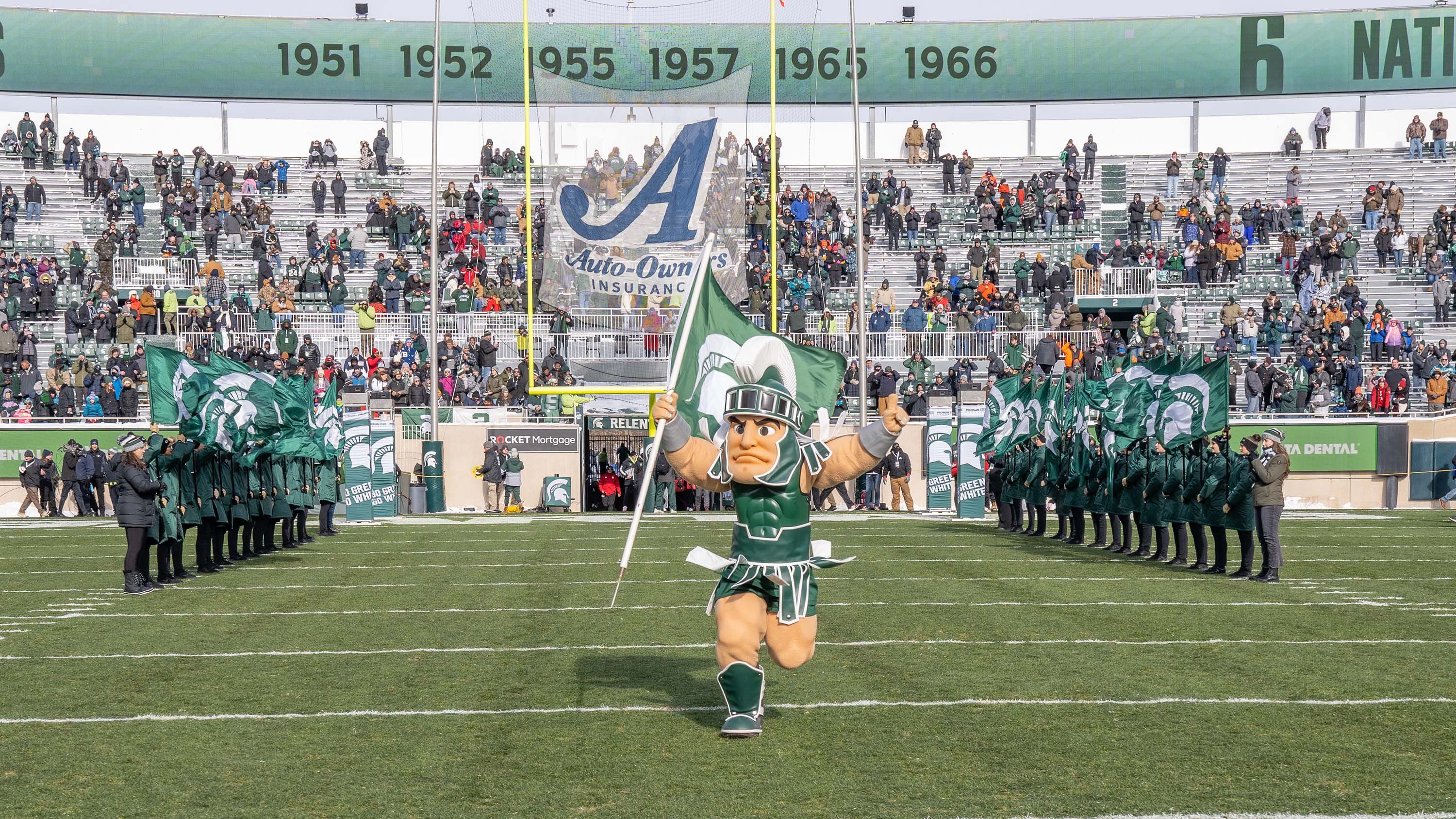 Sparty, MSU Mascot delivers the game flag to start the game against Indiana State University.