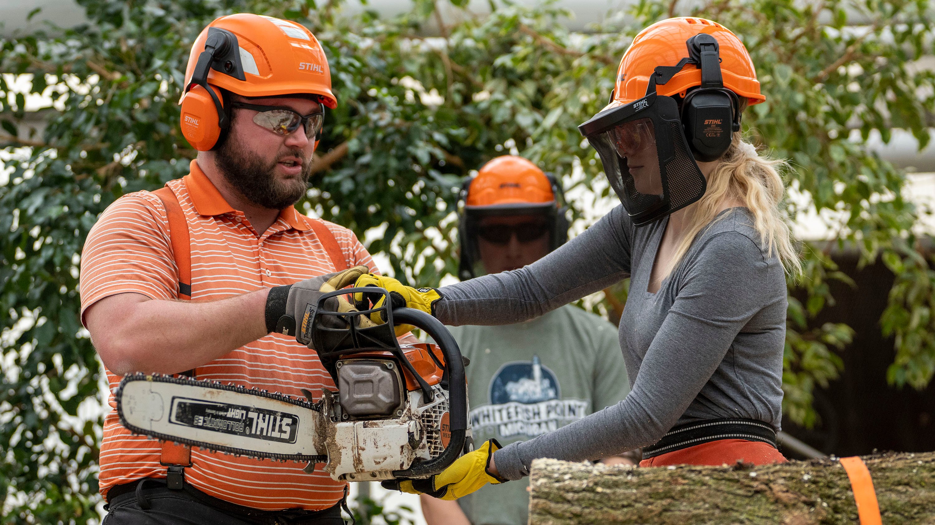 Students in chainsaw safety workshop
