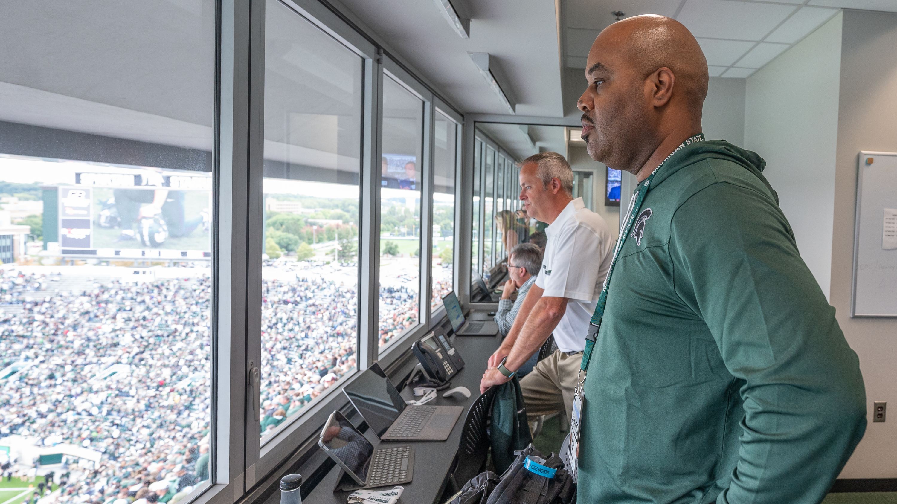 Marlon Lynch stands inside of the police command post overlooking Spartan Stadium.