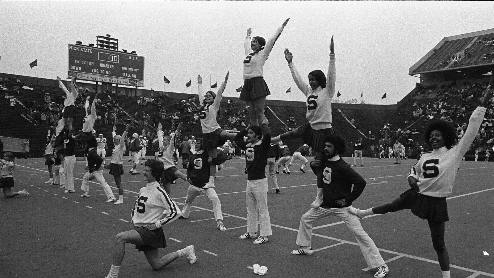 Cheerleaders during football game in 1972