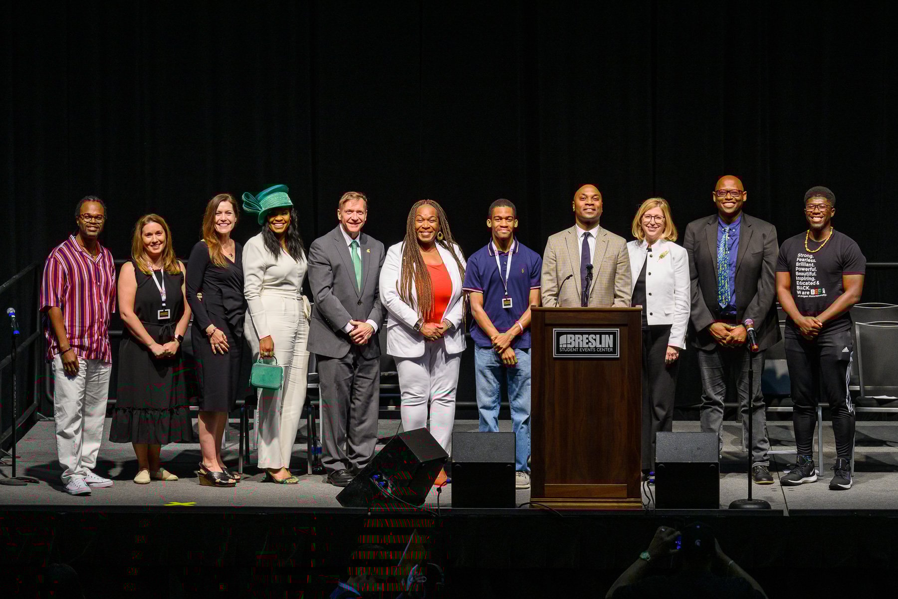 MSU Juneteenth speakers, from left to right, Stratton Lee III, Julie Sochay. Renee Knake Jefferson, Rema Vassar, Samuel Stanley Jr., Stephanie Anthony, Marcus McDaniel, Jabbar Bennett, Teresa Woodruff, Julian Chambliss and Antonio White posing on stage.