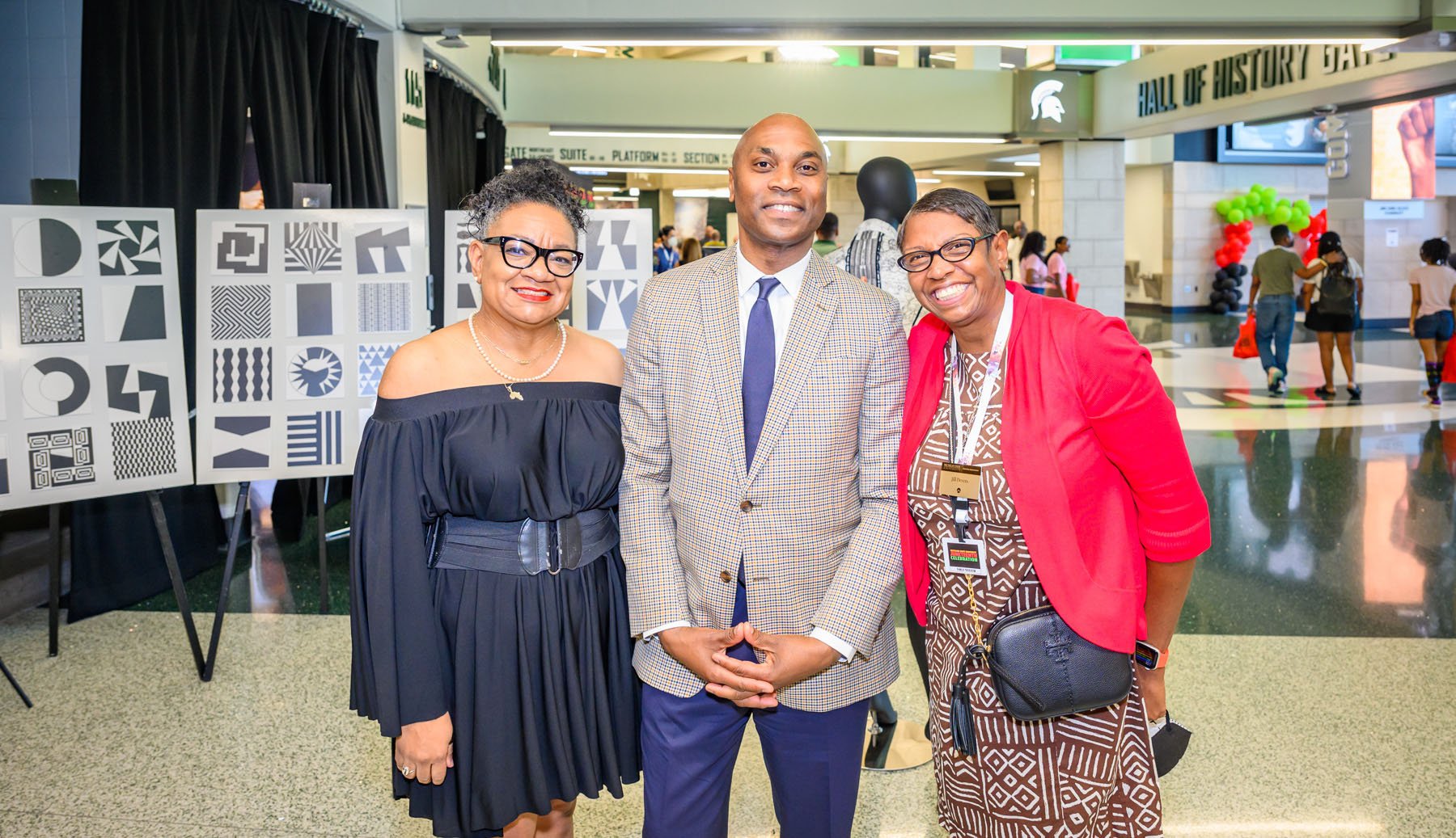 Critical Race Studies Artist-in-Resident Dr. Elka Stevens (left) participated in the Harlem Renaissance art exhibit showcasing selections from ?38.8% Visualizing Racial Identity in Search of Selfhood and Others.? Dr. Stevens poses with Vice President and Chief Diversity Officer Dr. Jabbar R. Bennett, and Assistant Director of Advancement Events Jill Devers. 