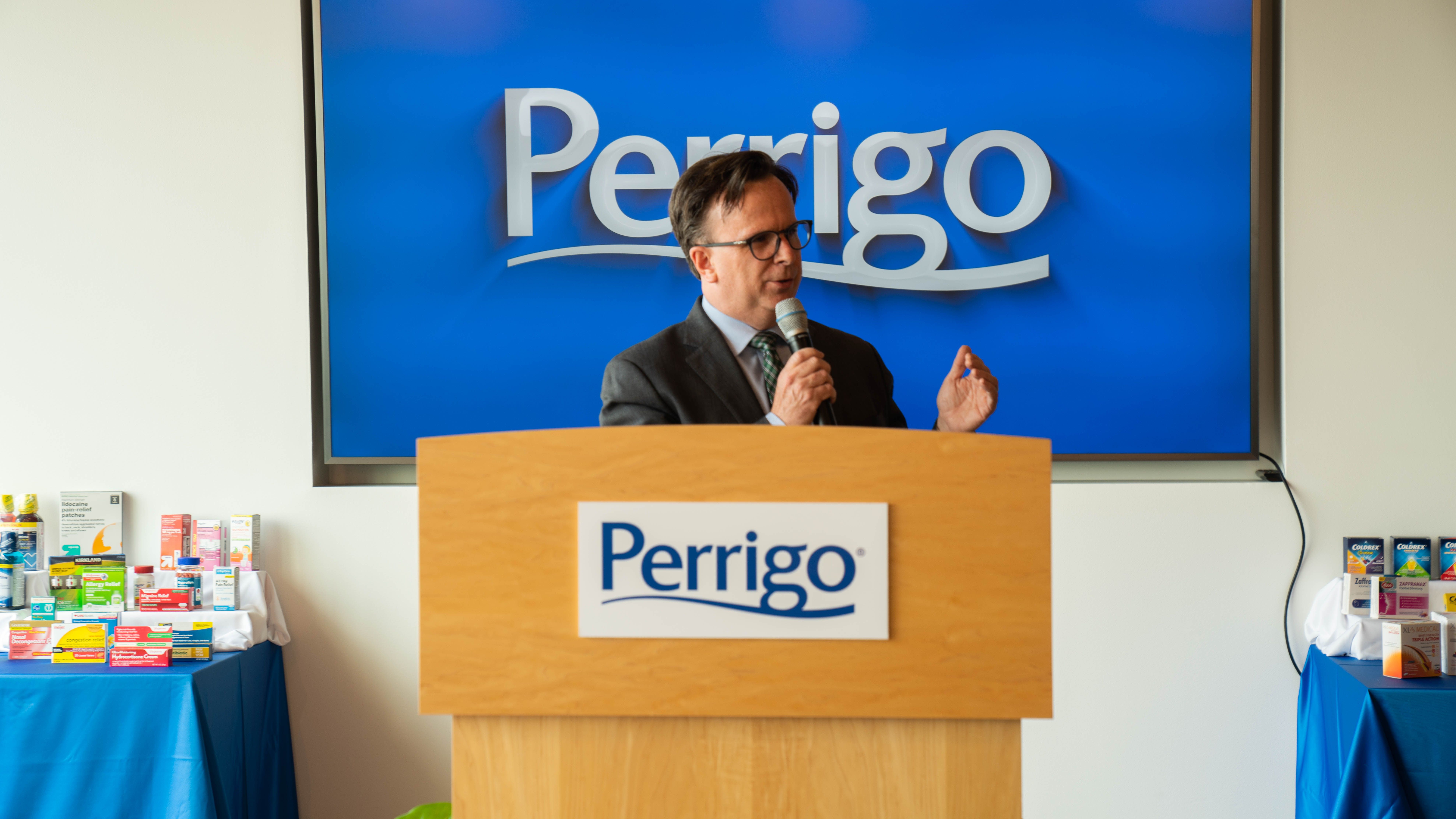 Norman J. Beauchamp Jr., M.D., MHS, executive vice president for health sciences, speaks behind a Perrigo podium