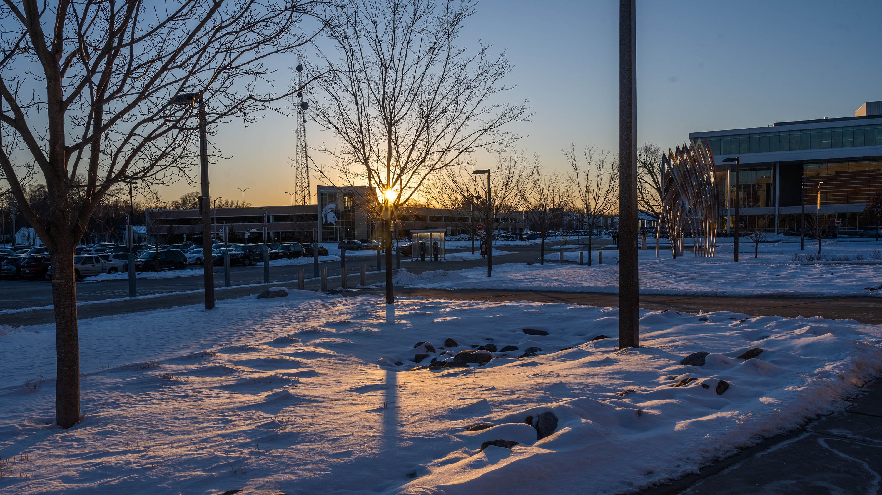 Sunset over snow fields near 1855 Place