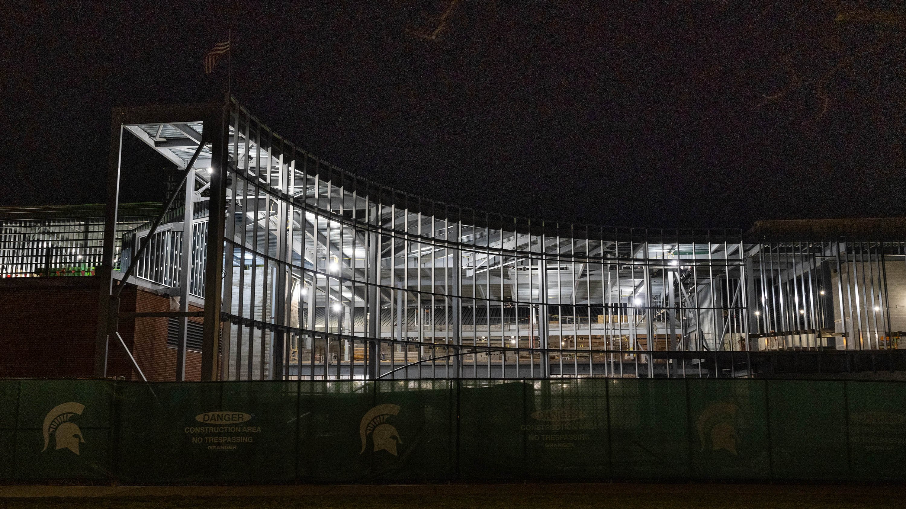 Construction to the Skandalaris building at night.