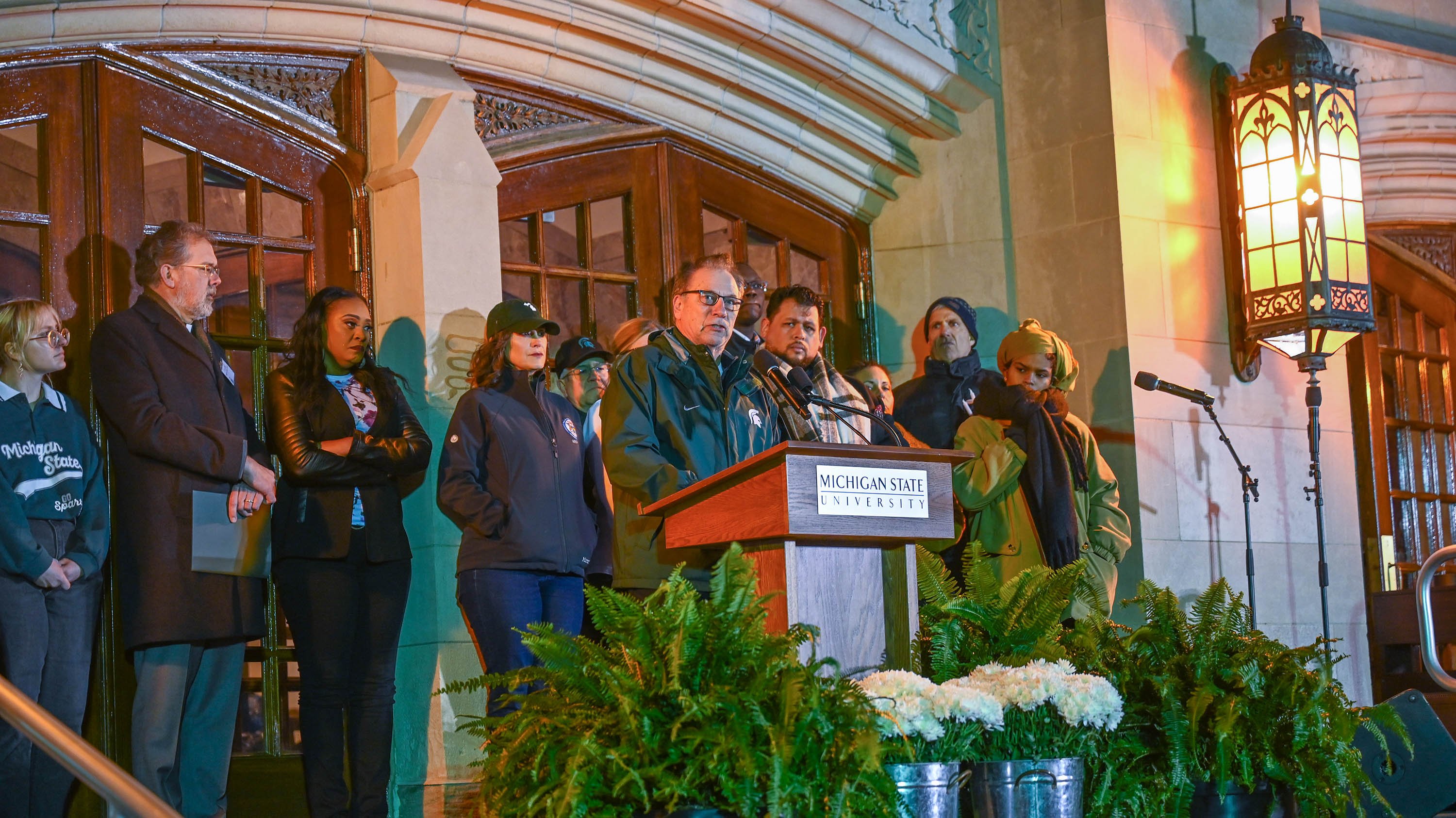 Coach Izzo speaking at vigil