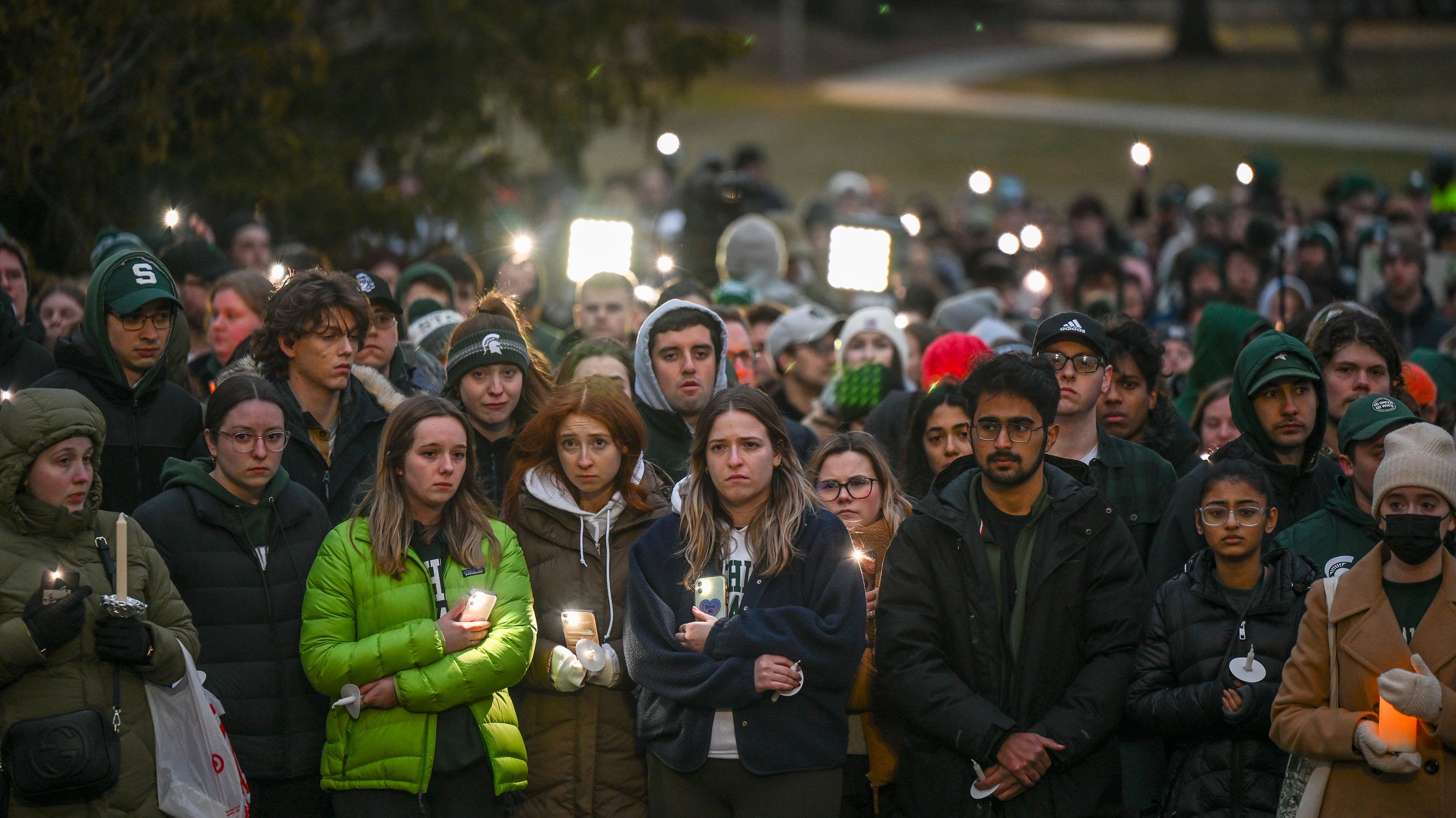 Students attending vigil