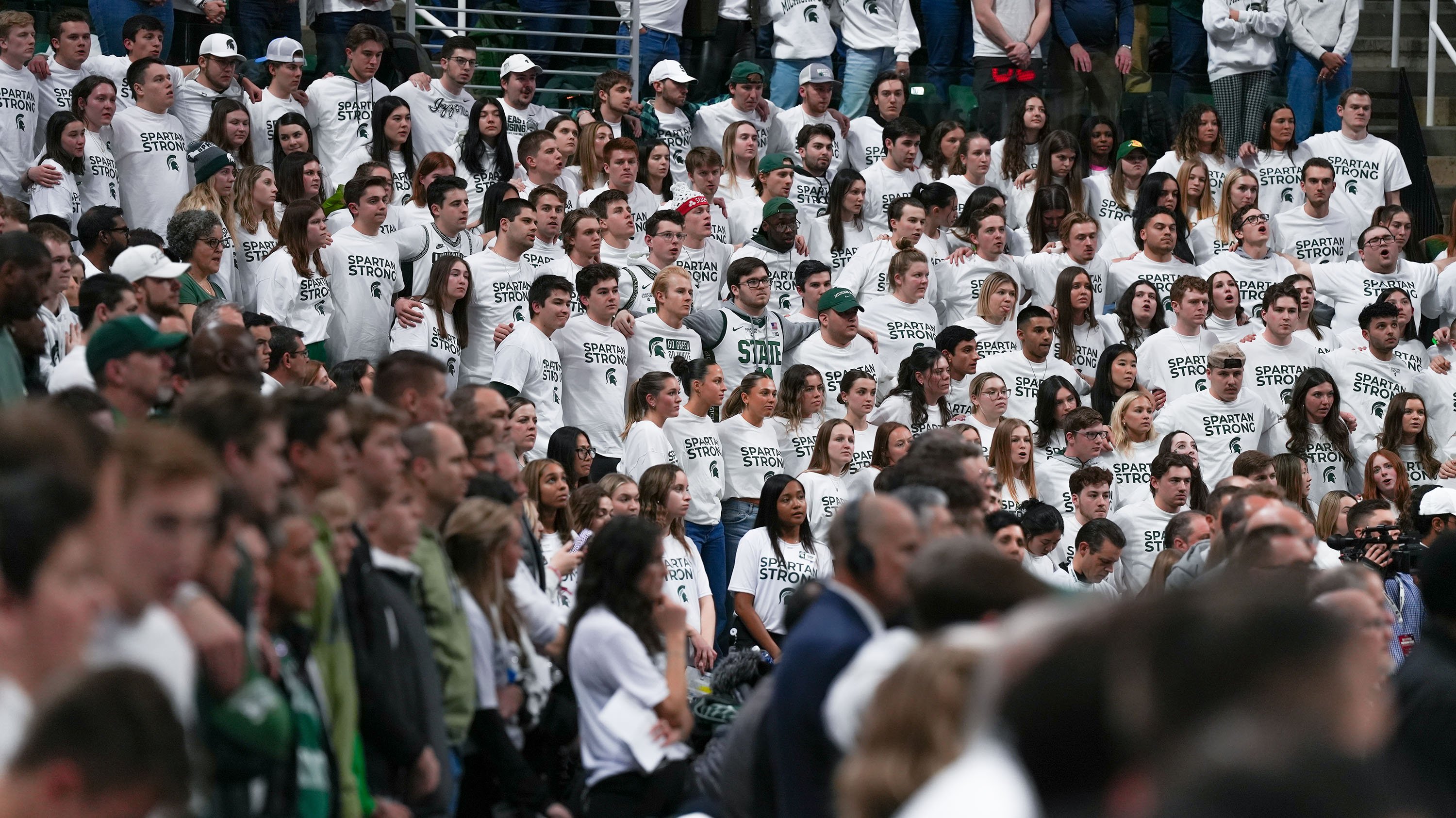 Students wearing 'Spartan strong' t-shirts in the Izzone