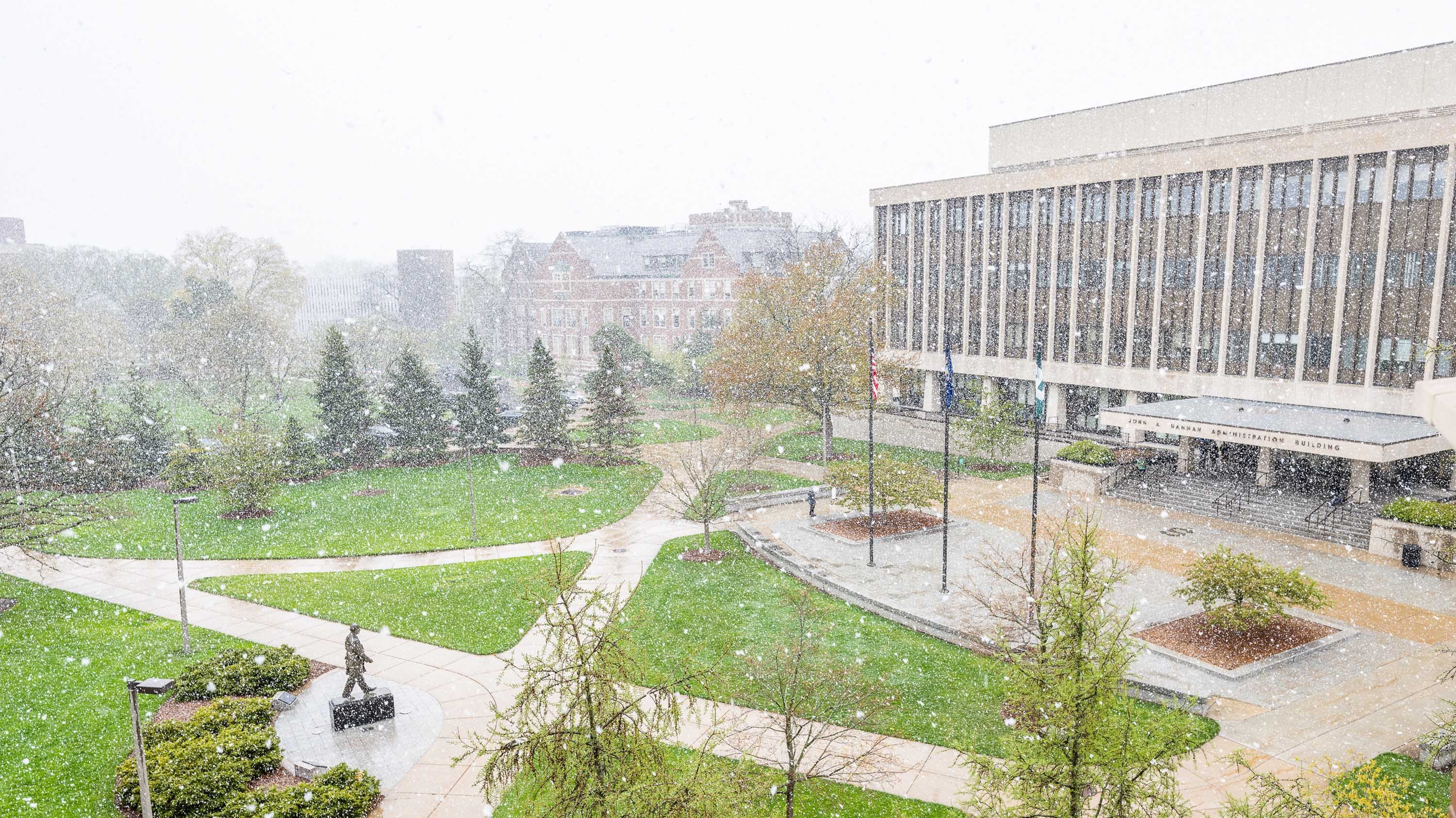 Hannah Administration Building and Plaza during a late spring snowstorm