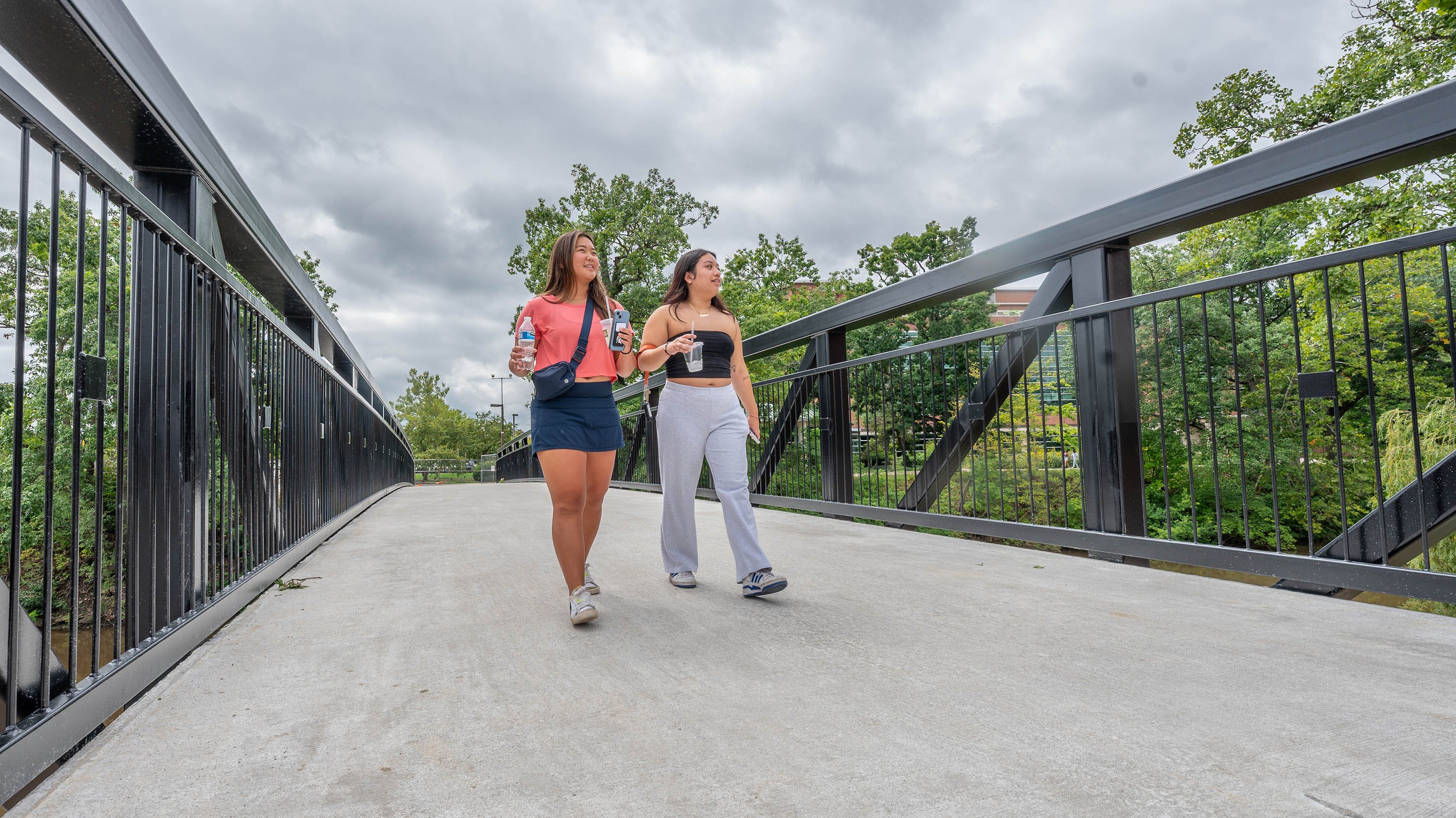 Students walking on bridge