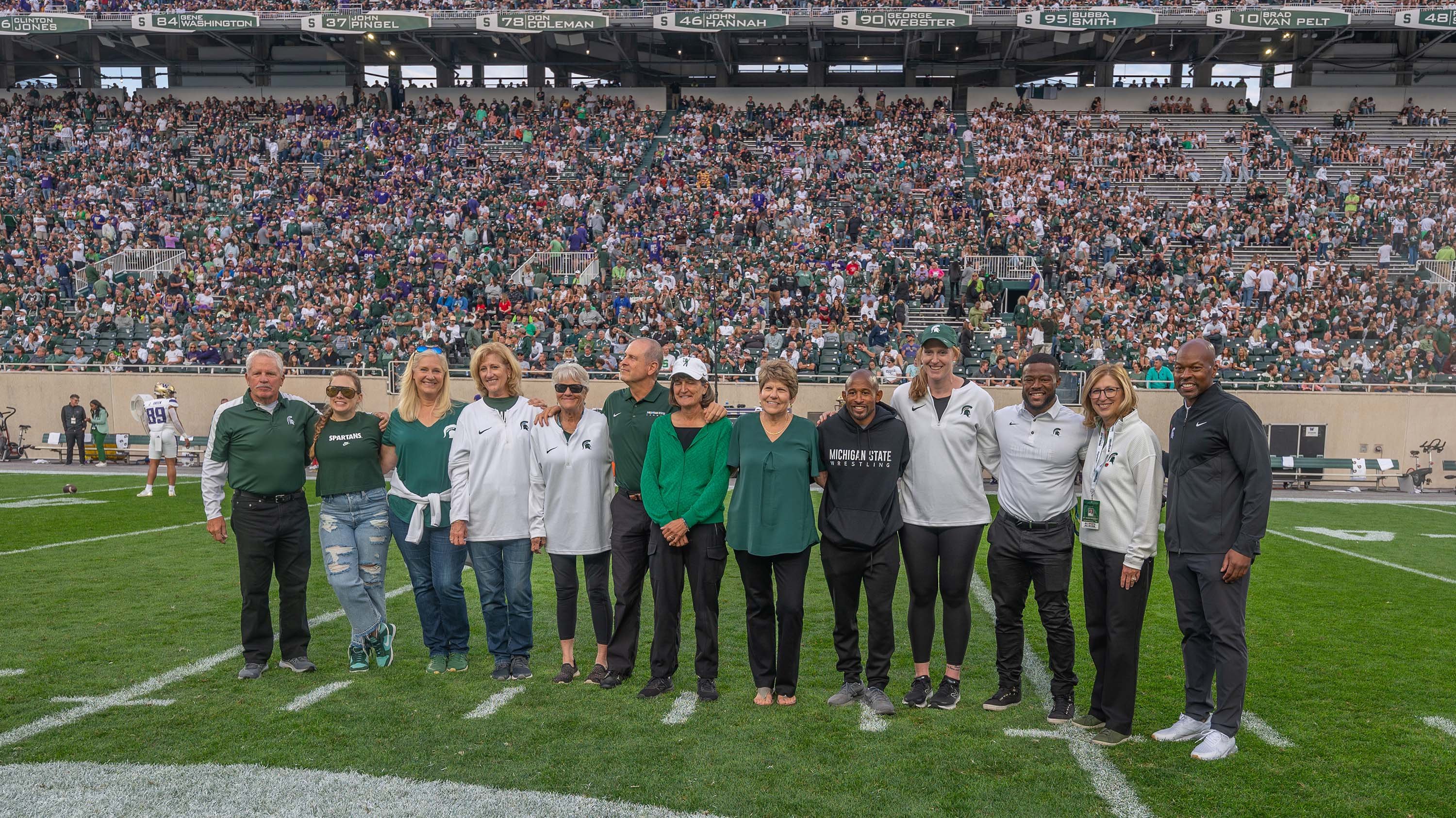Hall of Fame inductees in Spartan Stadium during ceremony