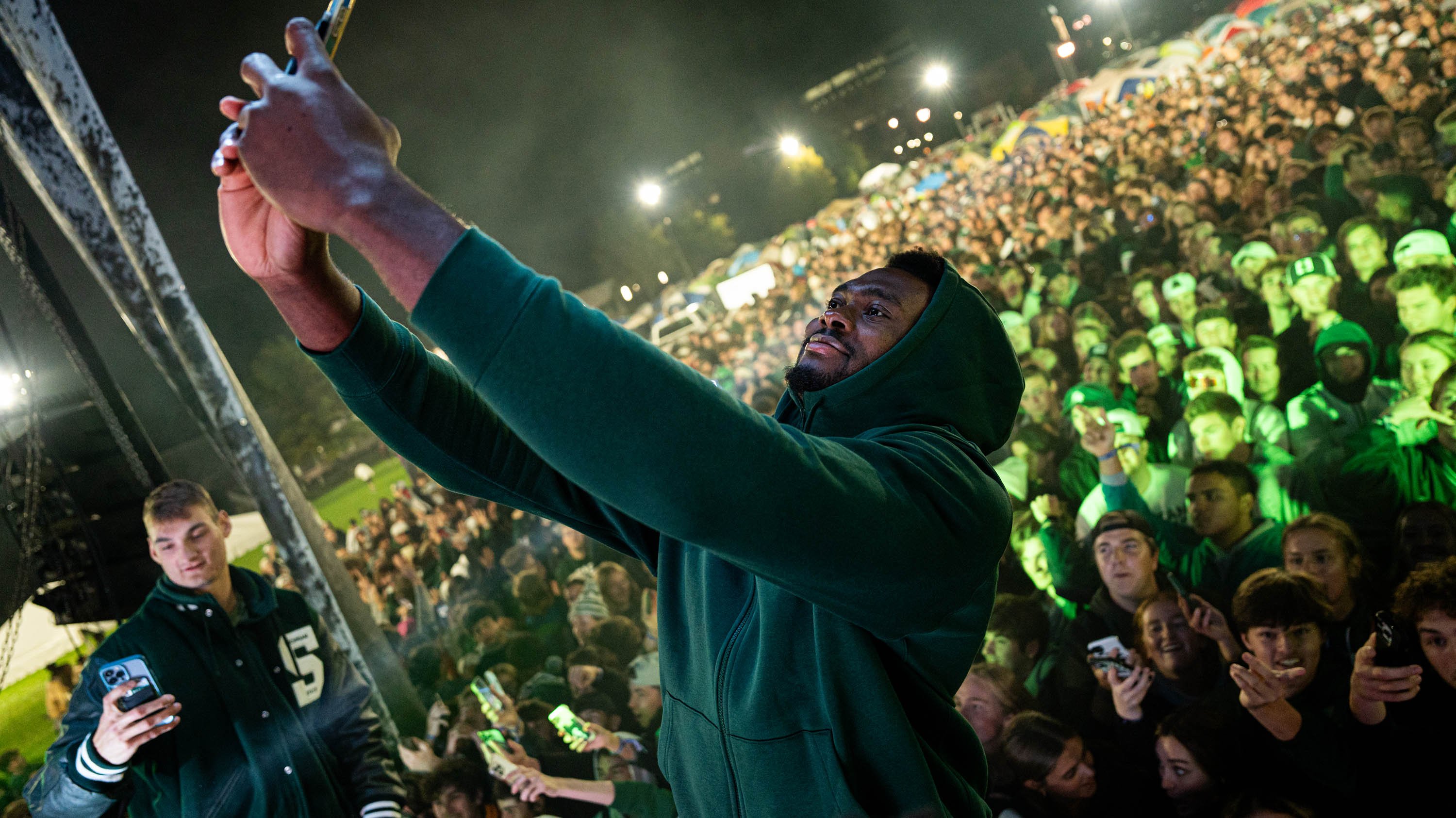 Mady Sissoko taking selfie with fans during Izzone campout