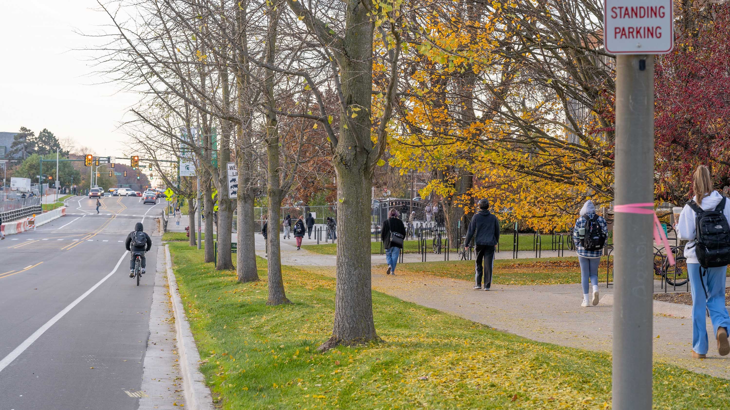 Students walking and biking along Farm Lane