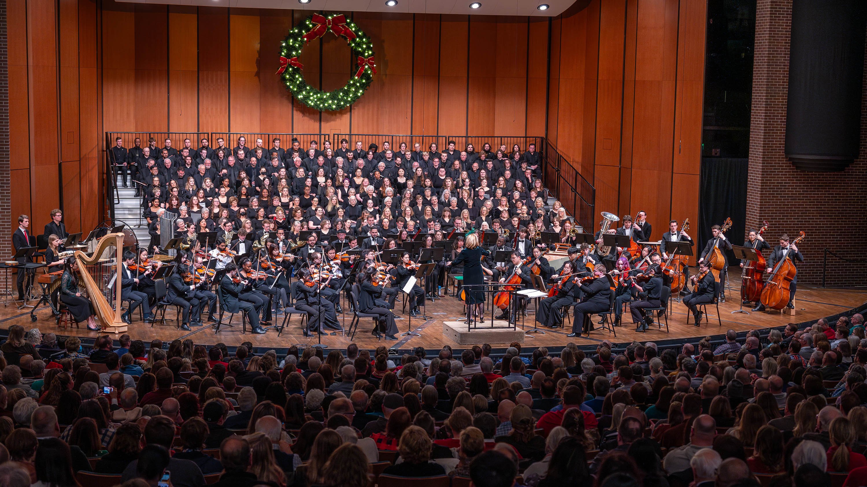Theresa Woodruff conducting at concert