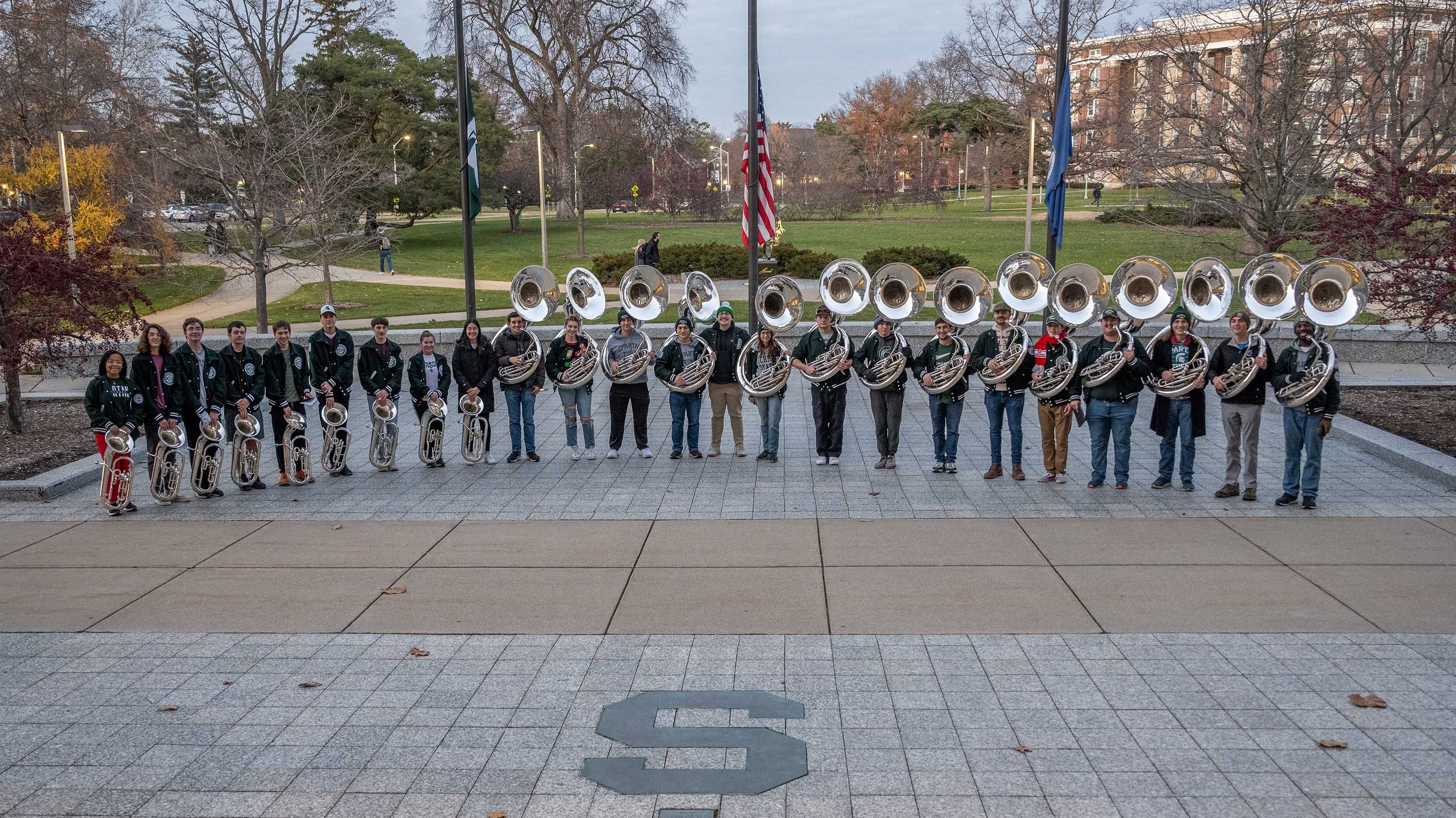 Tuba and baritone students playing in Hannah Plaza