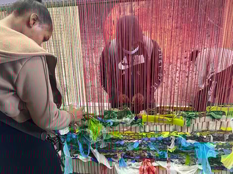 Green New DEAL program participants working on an art piece 