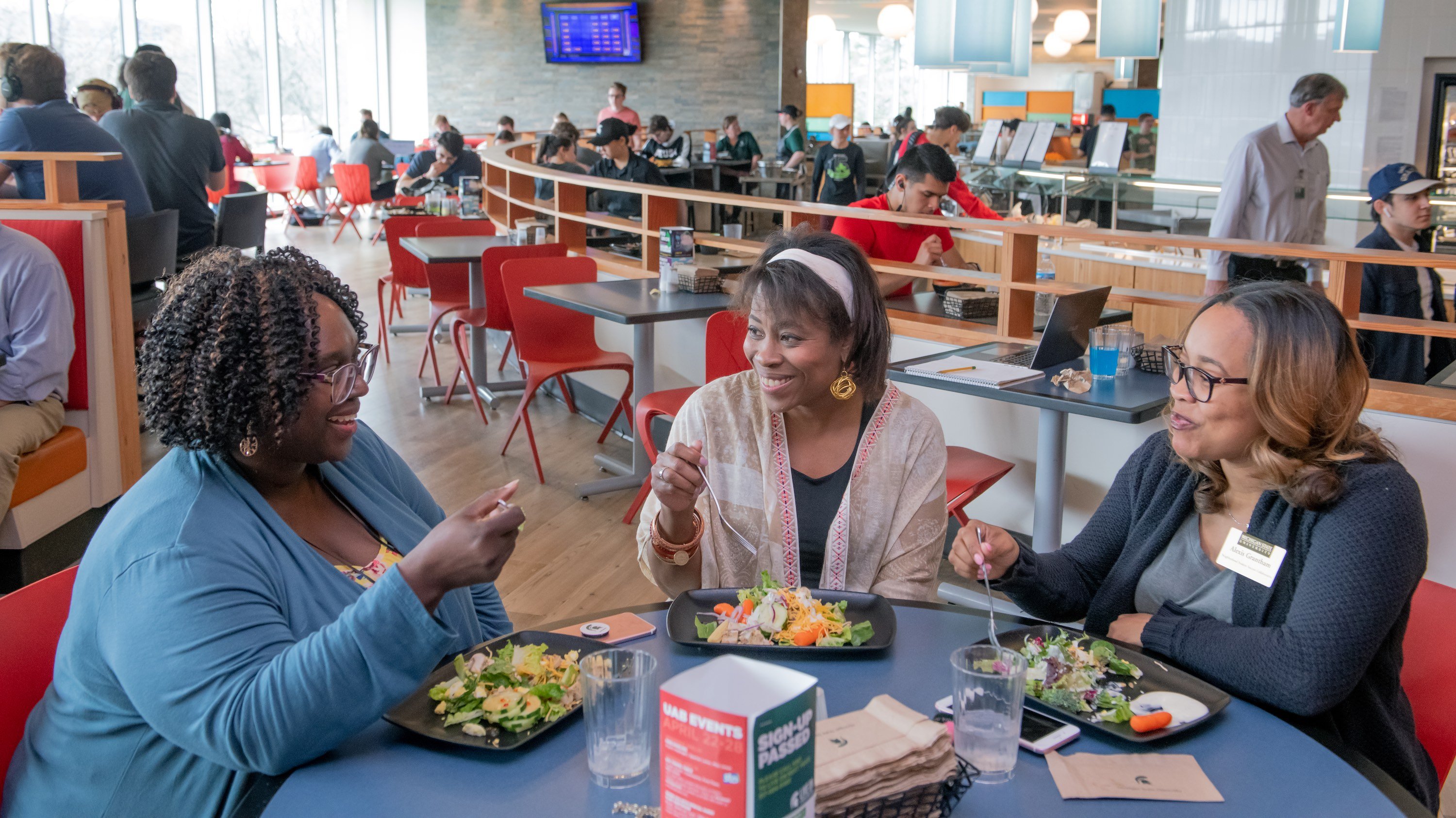 Employees eating lunch at The Edge at Akers